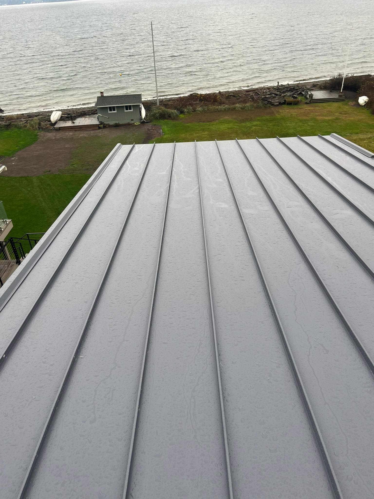 New Construction Roof Installation in Indianola, WA by Hanley Construction