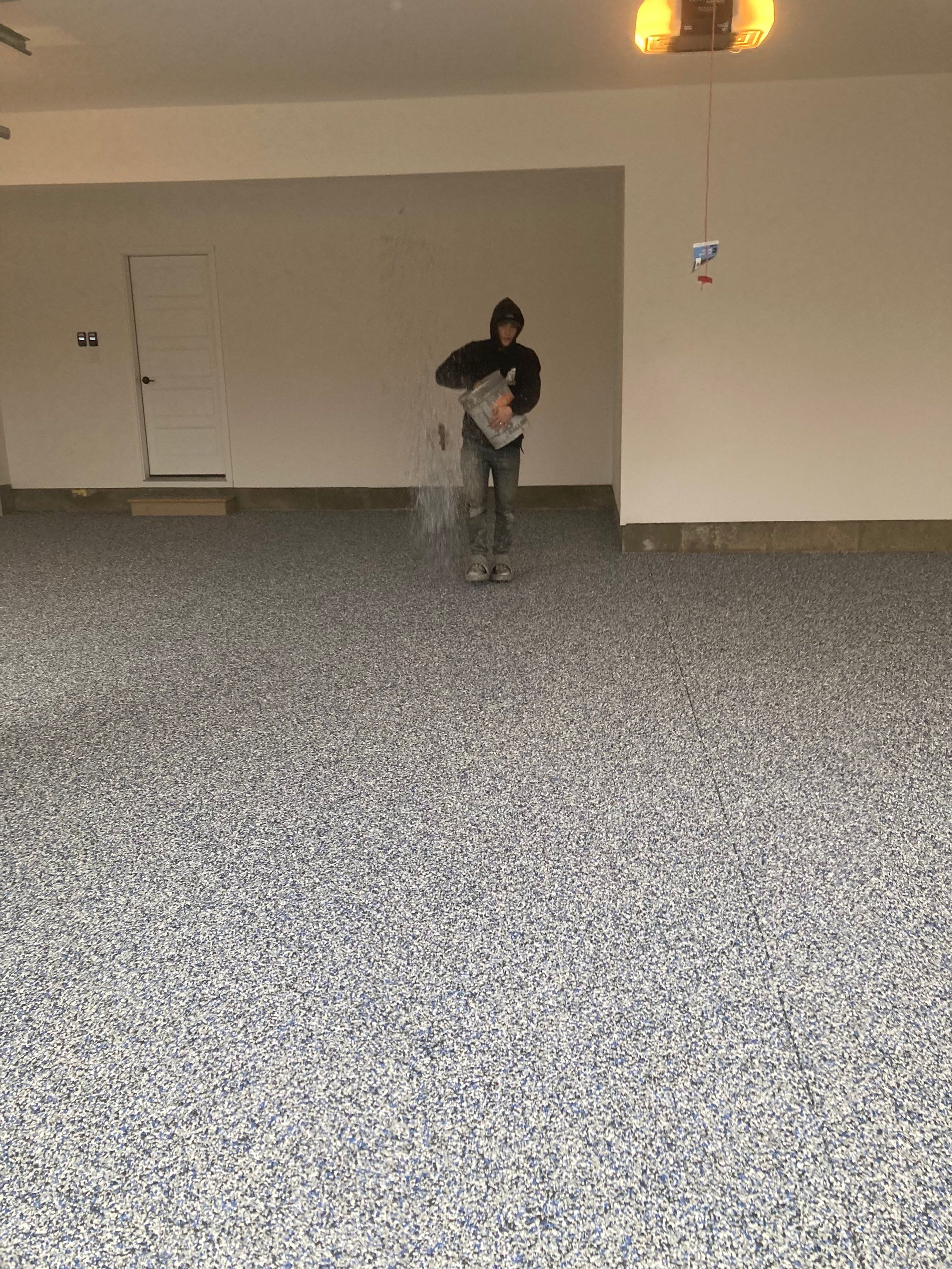 Garage Transformation using Domino with Blue by Croc Coatings, LLC