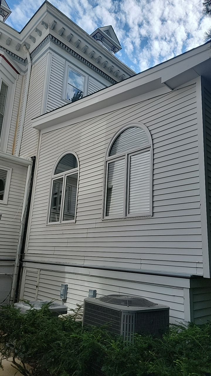 Housewashing  using Algaecide, soft wash soap by Northern Power Washing LLC.