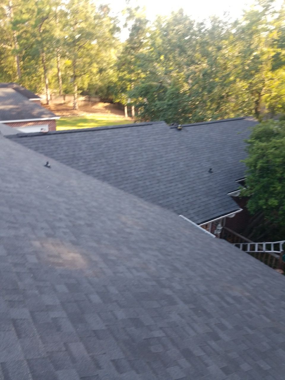 Residential Roofing Installation using Roof Replacement by American Roofing & Construction LLC