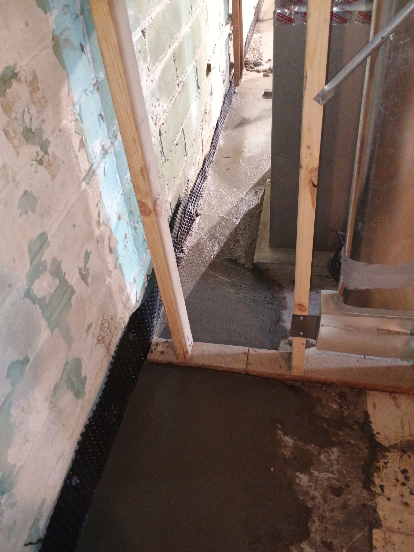 Interior Drain Tile for a South Minneapolis Basement by Waterproofing Northeast