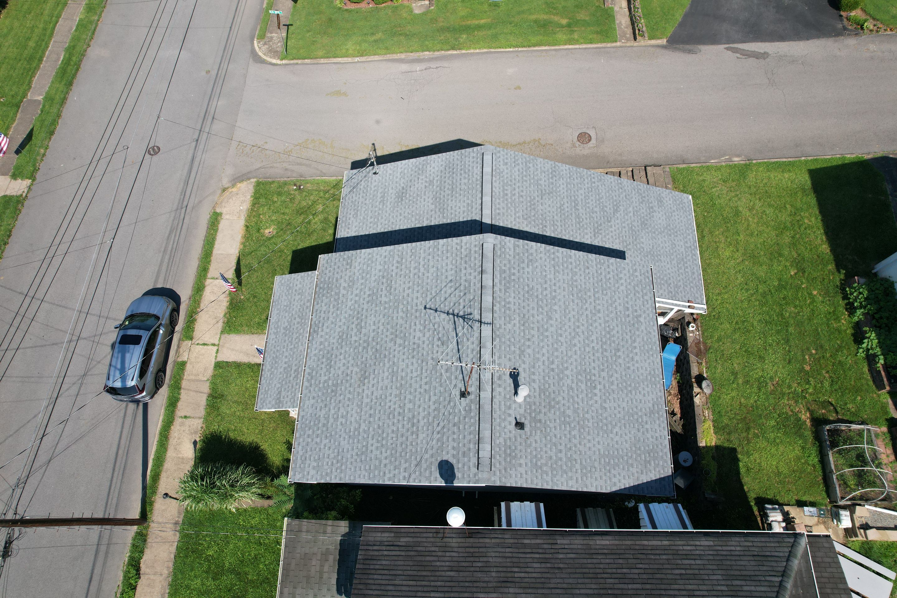 Residential Roofing Installation using GAF Timberline HDZ Oyster Grey by Rainstoppers Roofing