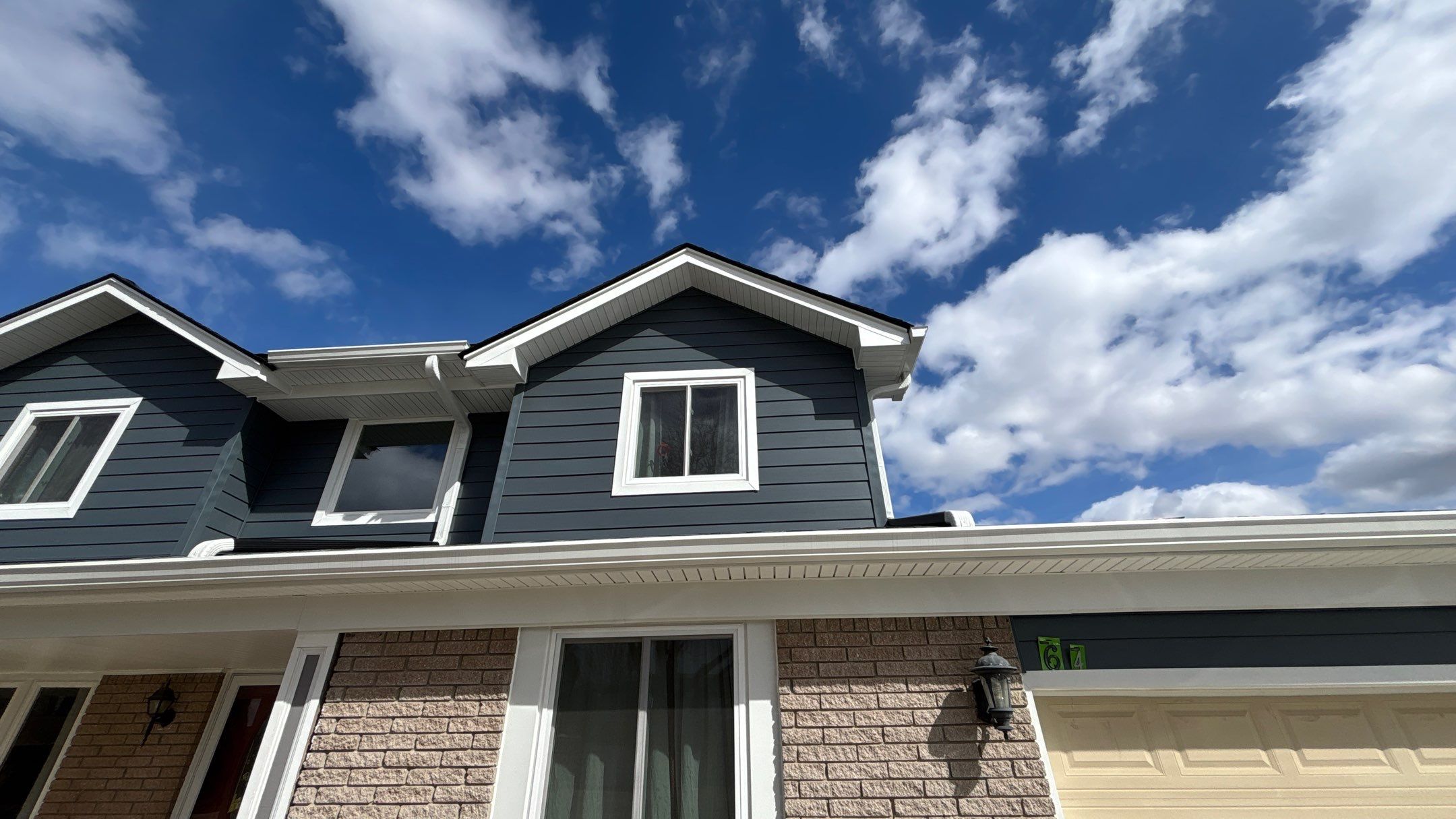 Siding Replacement using Alside Midnight Blue by 180 Contractors