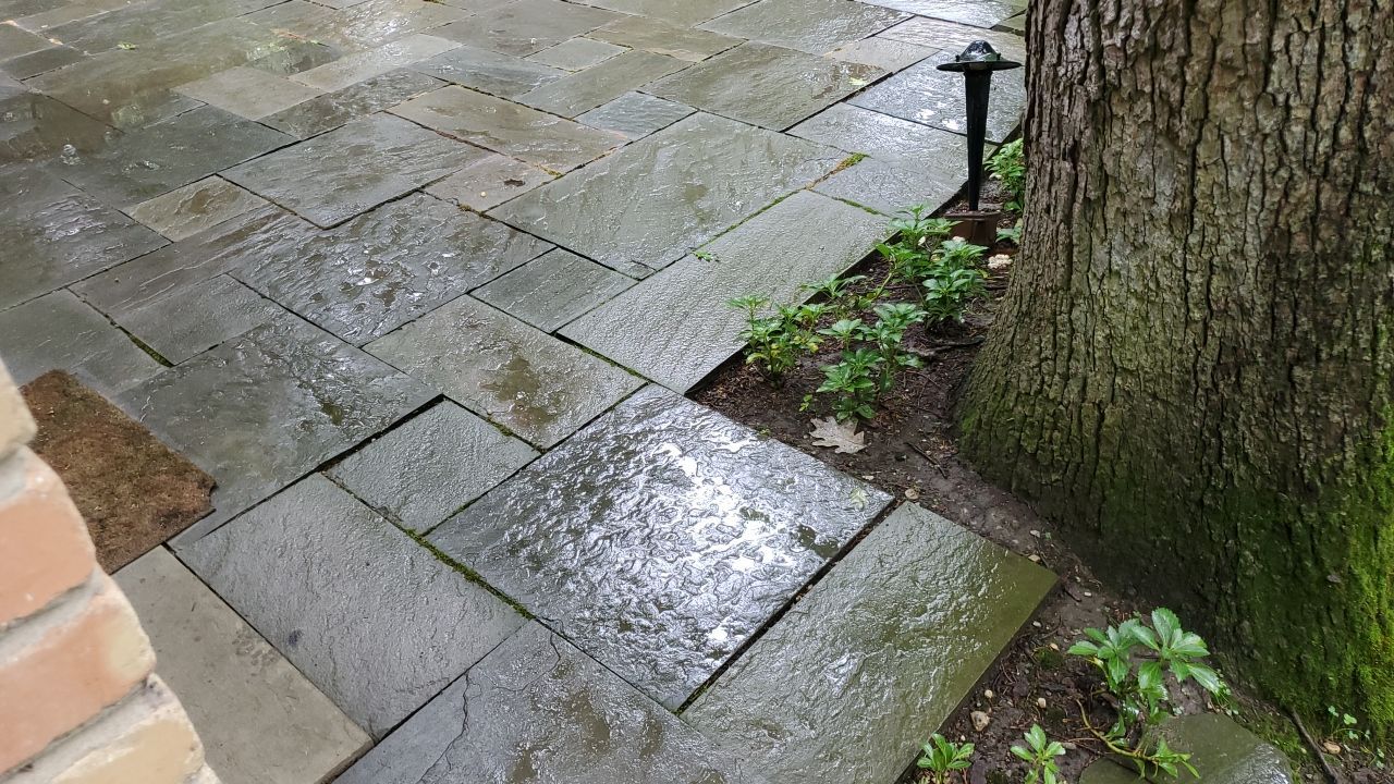 Bluestone patio cleaning by Northern Power Washing LLC.