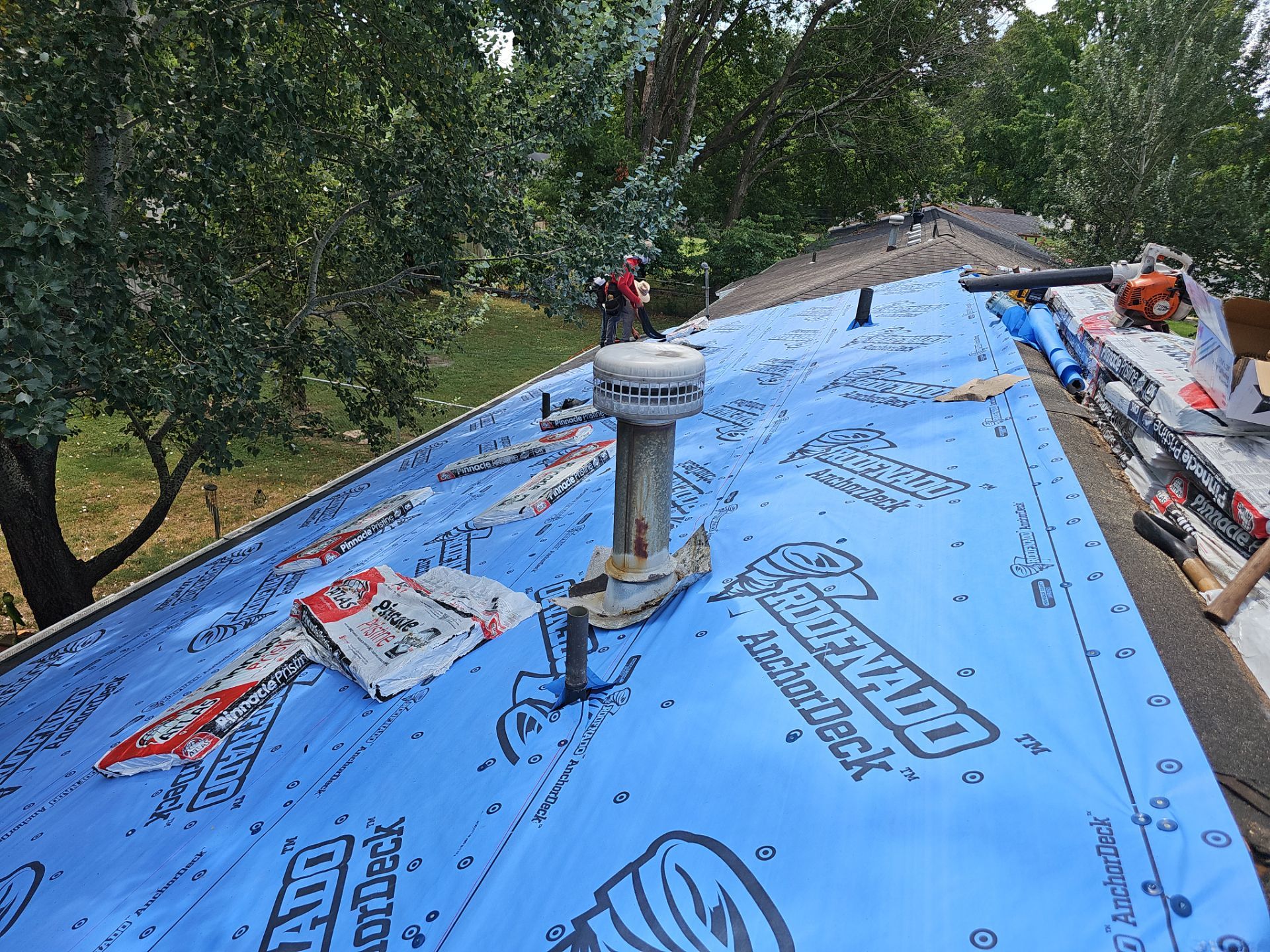Residential Roofing + Gutters & Gutter Guards Install  by Titan Commercial & Residential Roofing 