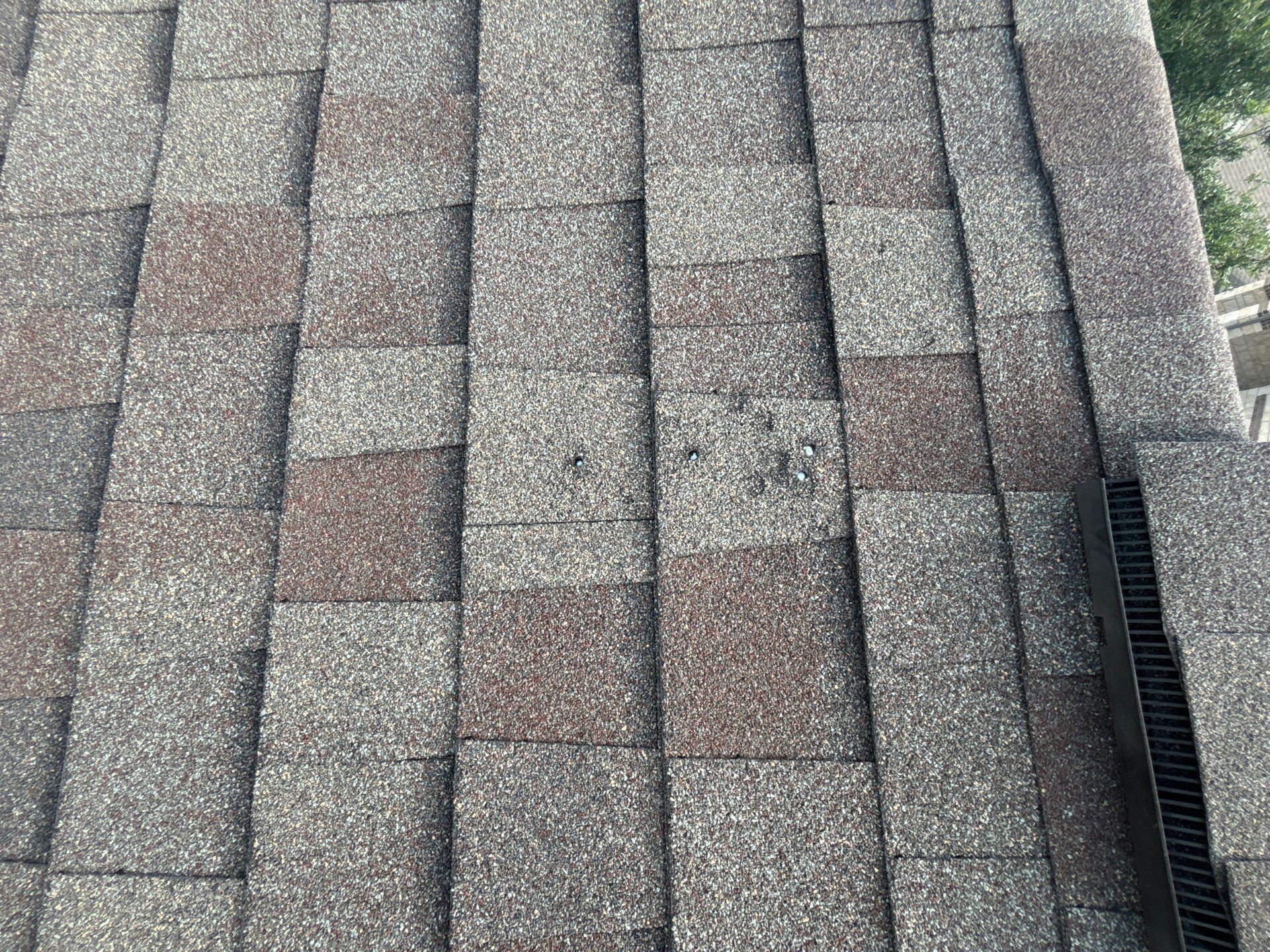 Hail Damage using Owen's Corning Duration (Lifetime) Shingles by Roof Repair Company