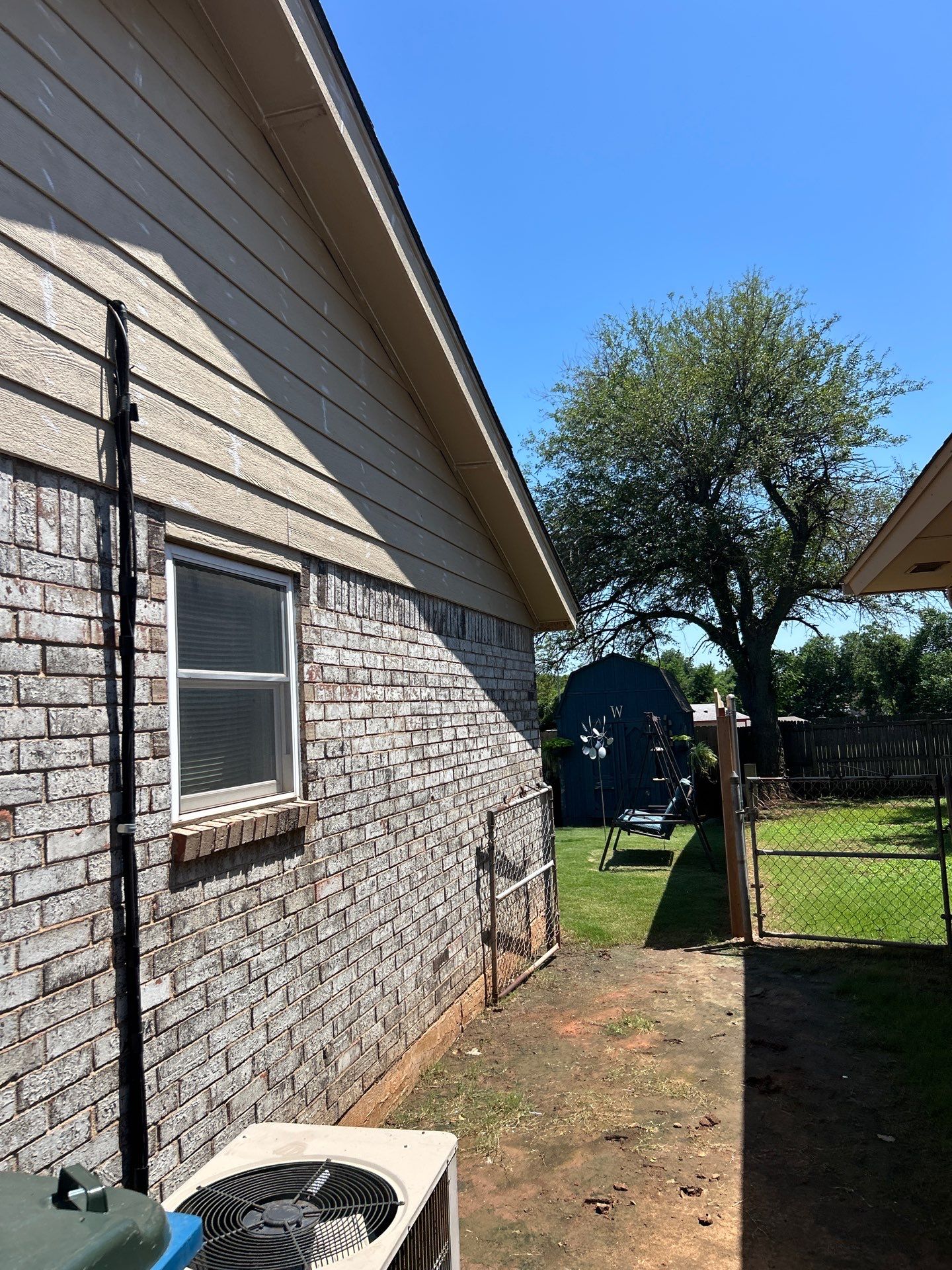 siding replacement & soffit replacement in Edmond by McCann's Roofing and Construction