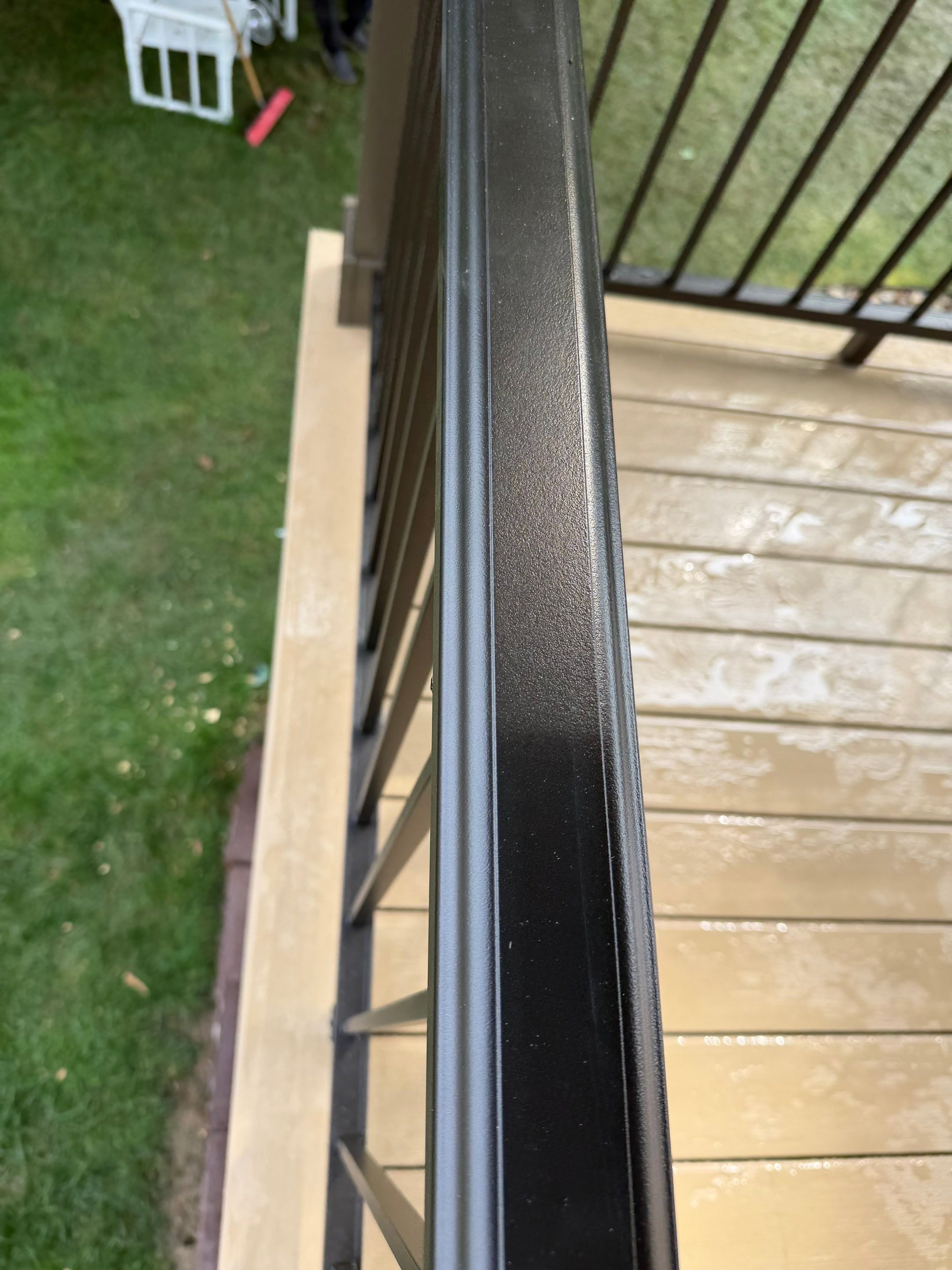 Elevated Composite Deck Installation with Covered Porch in South Park Township by Cousins Roofing Siding & Decks