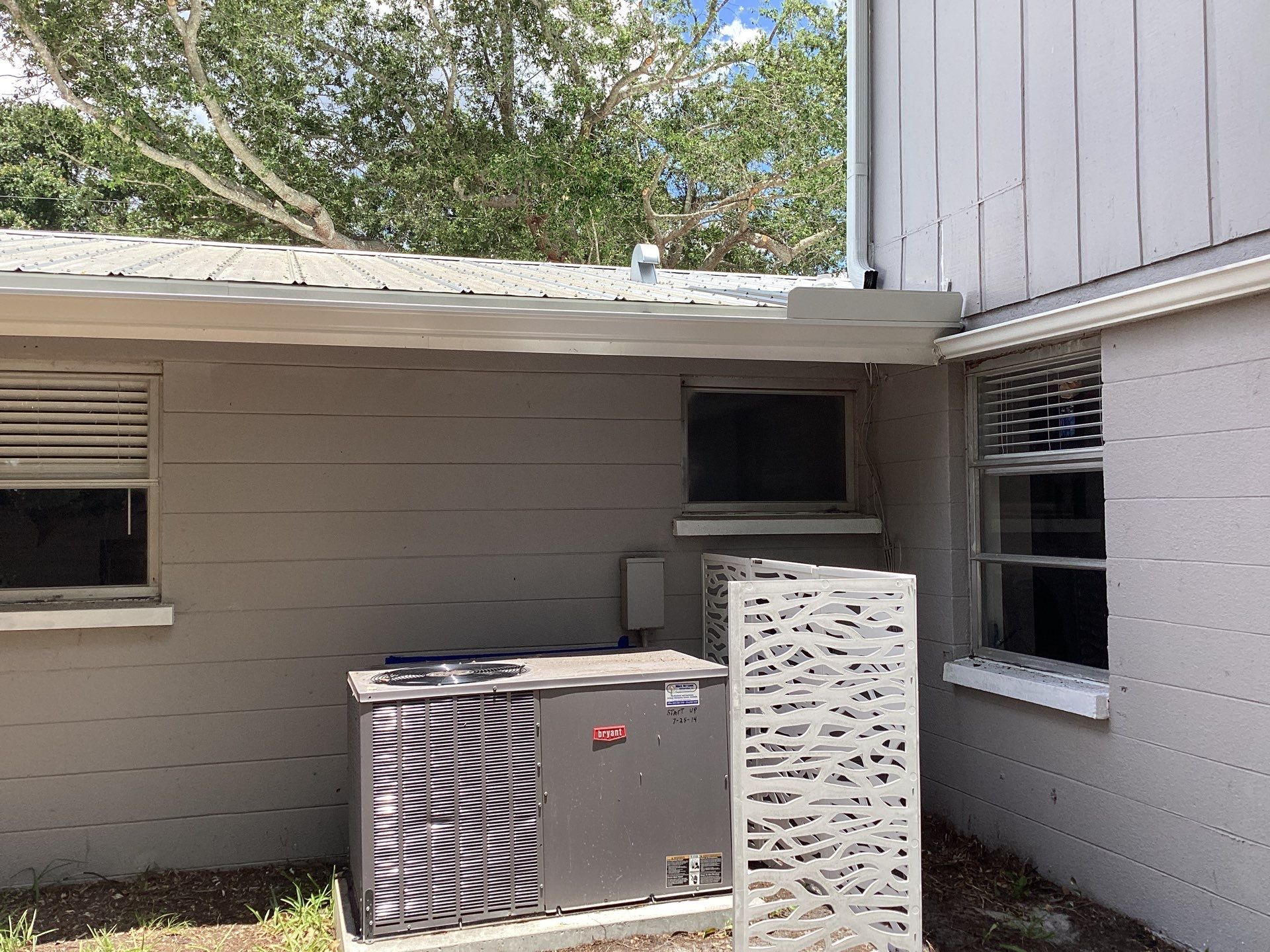 White K Style Seamless Gutters using 3X4 Elbow Downspout in Sarasota FL by Gutter Professors