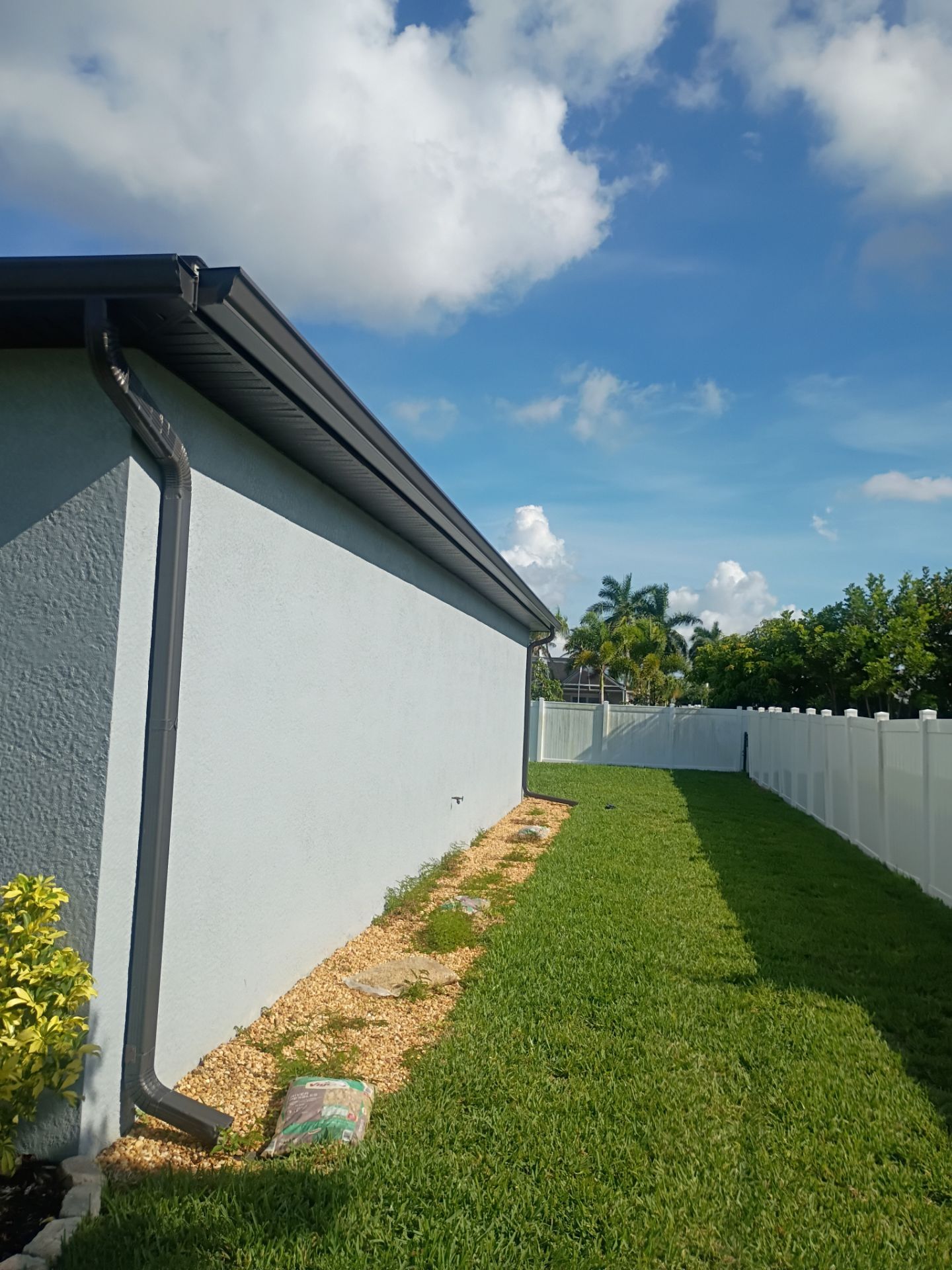 Dark Bronze Seamless Gutters using 6 Inch Seamless Gutters in Cape Coral FL by Gutter Professors
