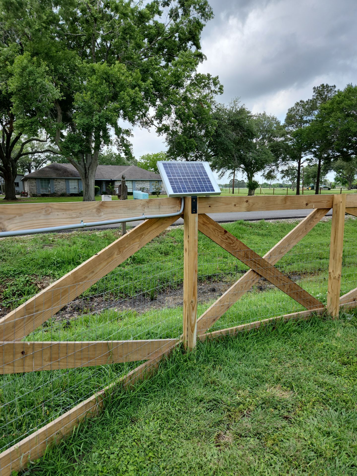Custom Driveway Gate Powered by Solar by Tim's Fences