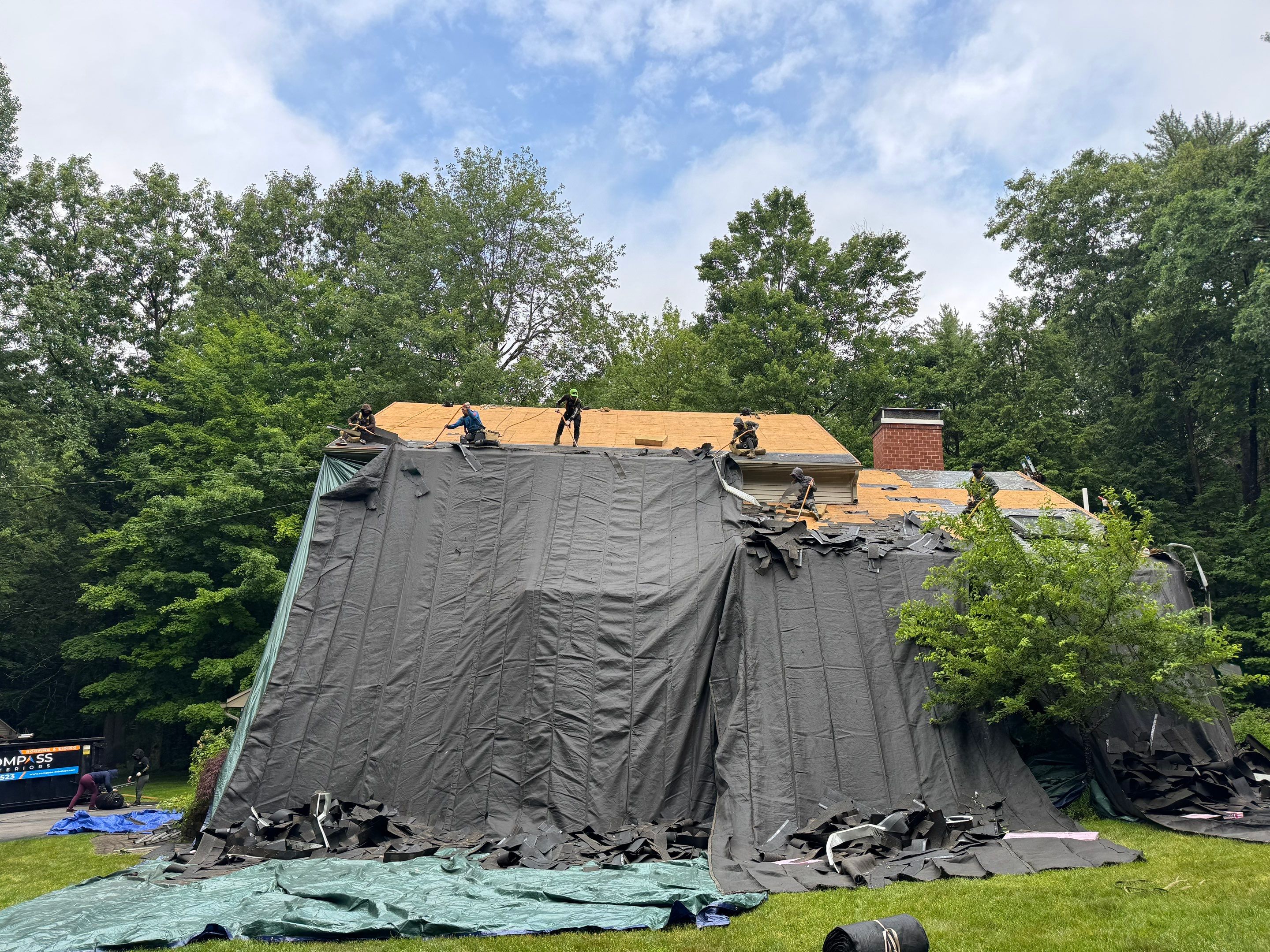 Amherst NH Roof Replacement with Owens Corning Duration Teak Shingles and Velux Skylights by Compass exteriors