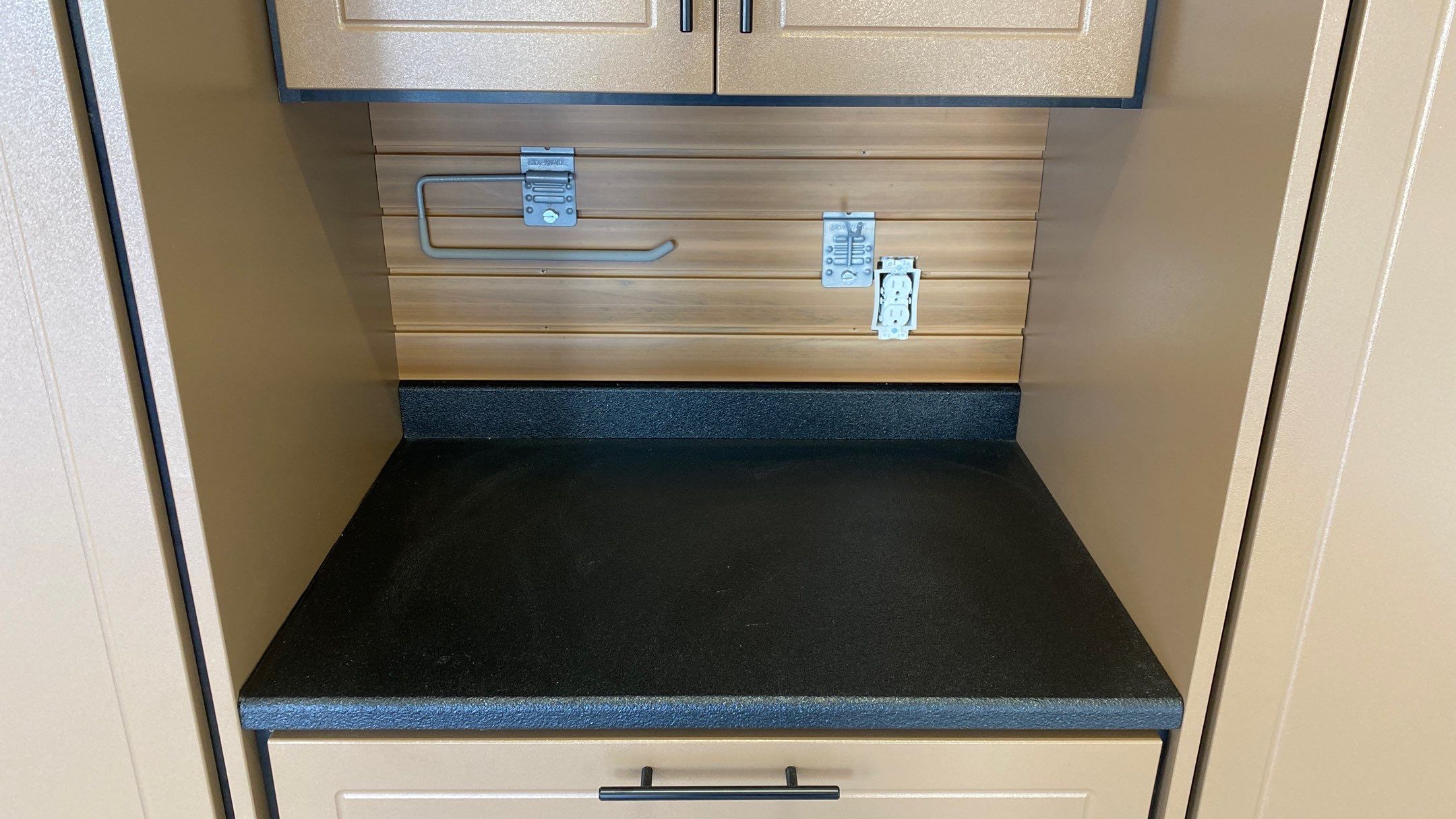 Kenny & Debbie transformed their garage with a Banner Garage Floor and cabinets by Banner Garage