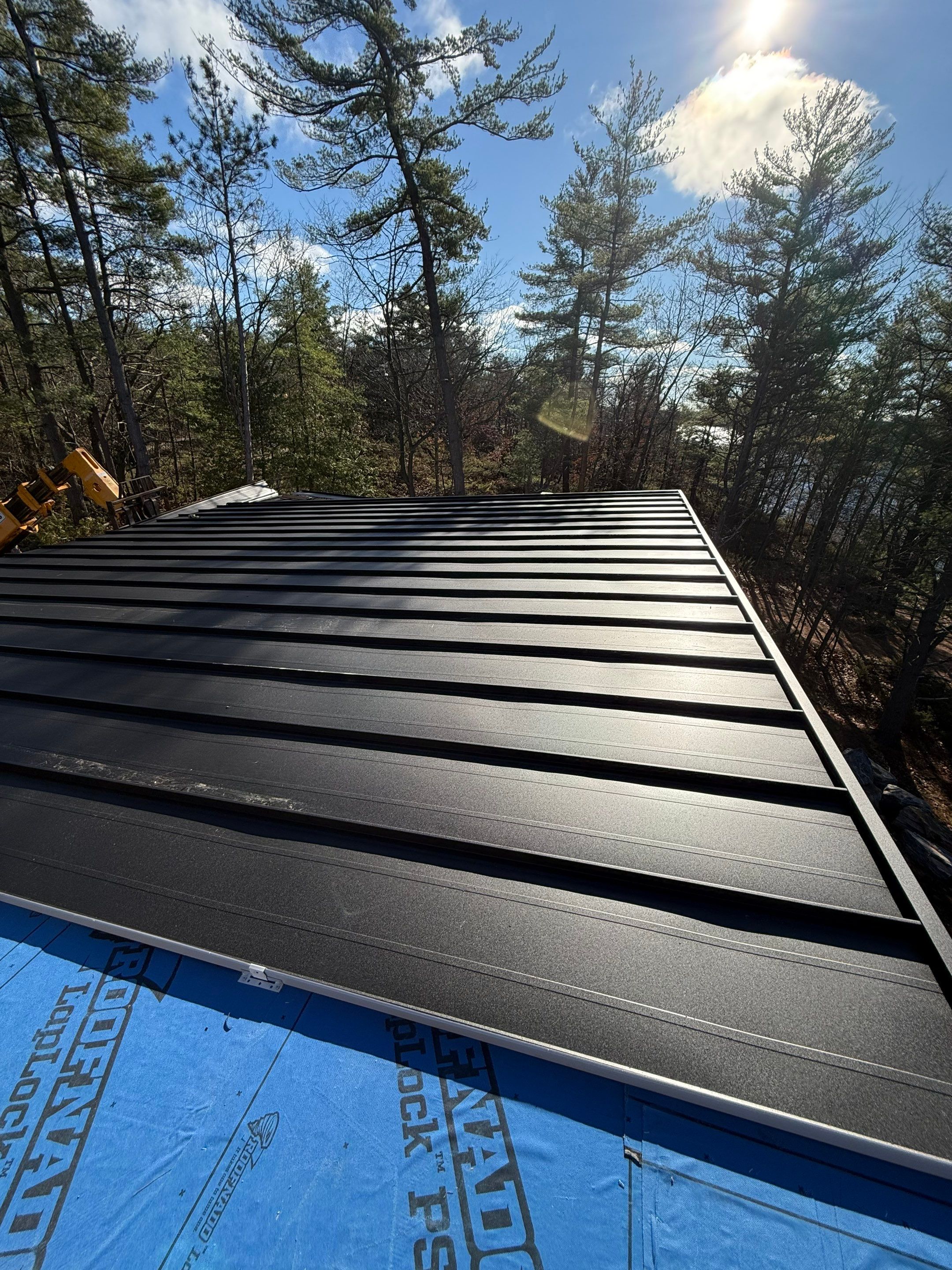 New Home Construction using 16" Standing Seam Panels by Jay Carter Roofing & Sheet Metal