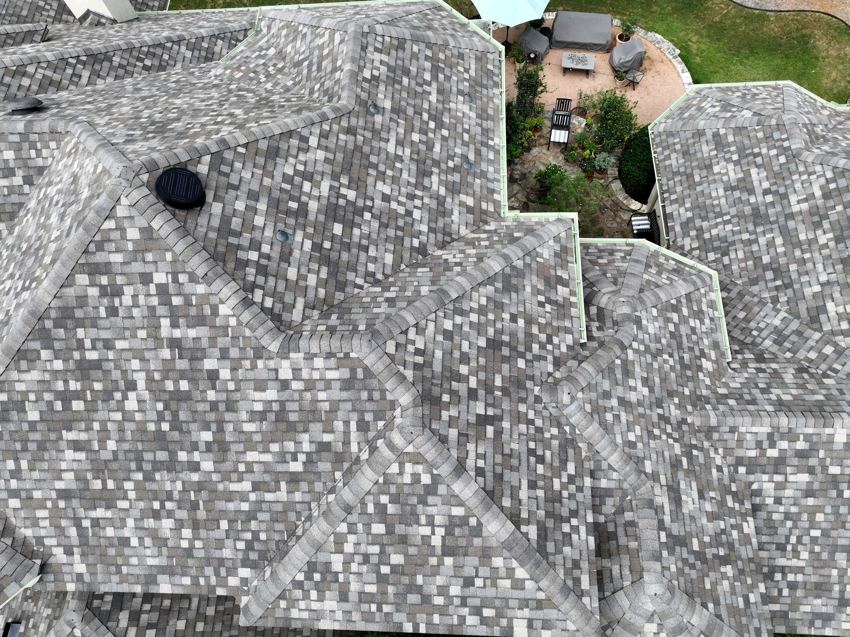 Residential Roof Replacement using 30 Year Laminate Shingles with High Profile Ridge by Premier Roofing and Contracting