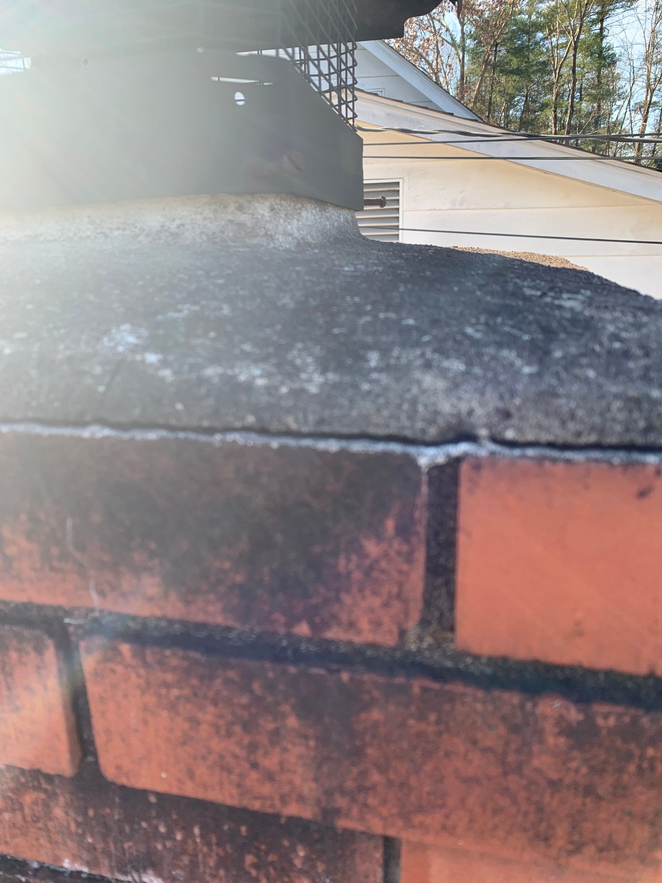 Residential Roofing Repair Chimney Flashing and Cap by Secure Construction Company Inc