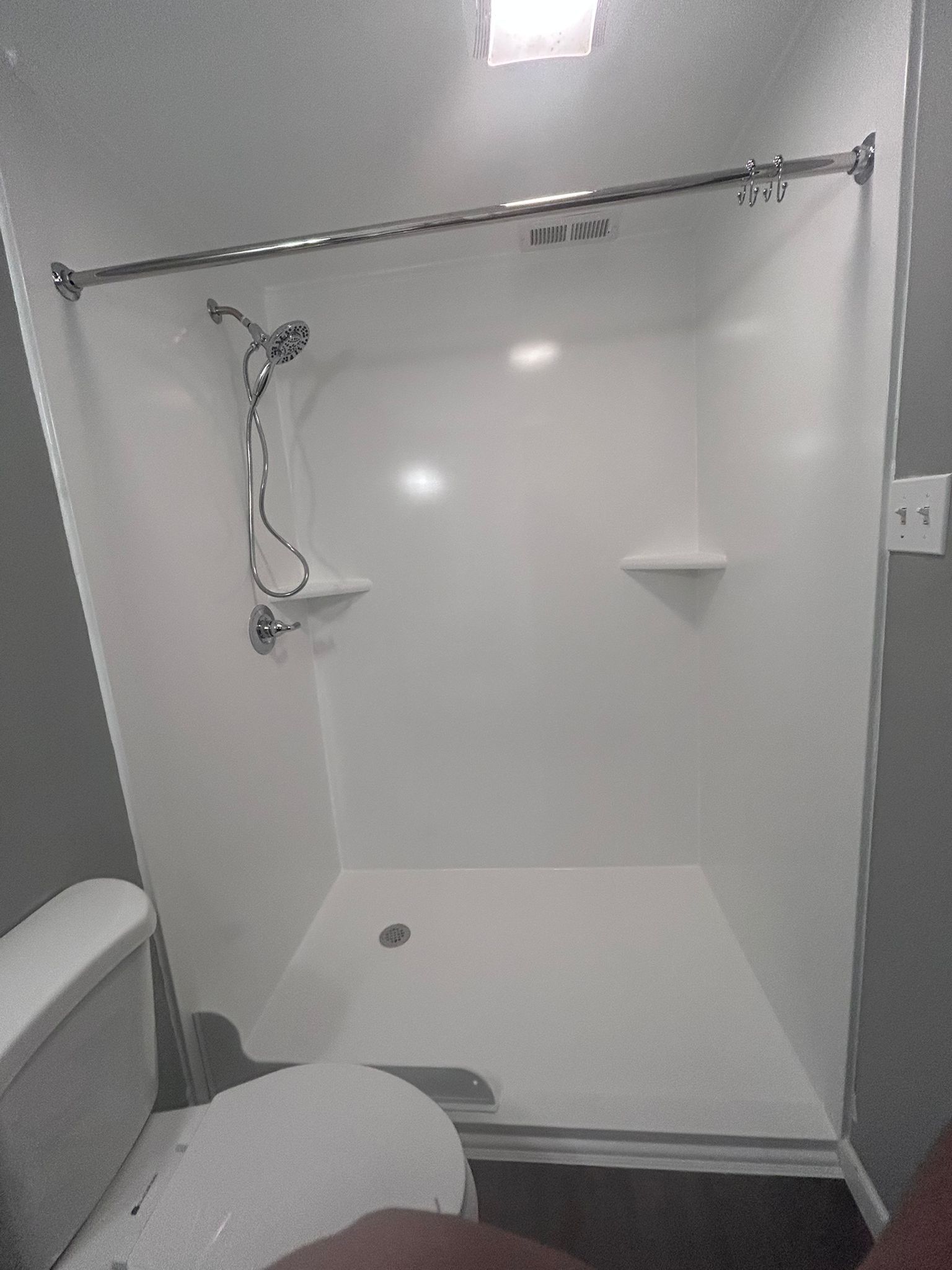 2 bathroom remodels using maintenance free products by Window Depot of Annapolis
