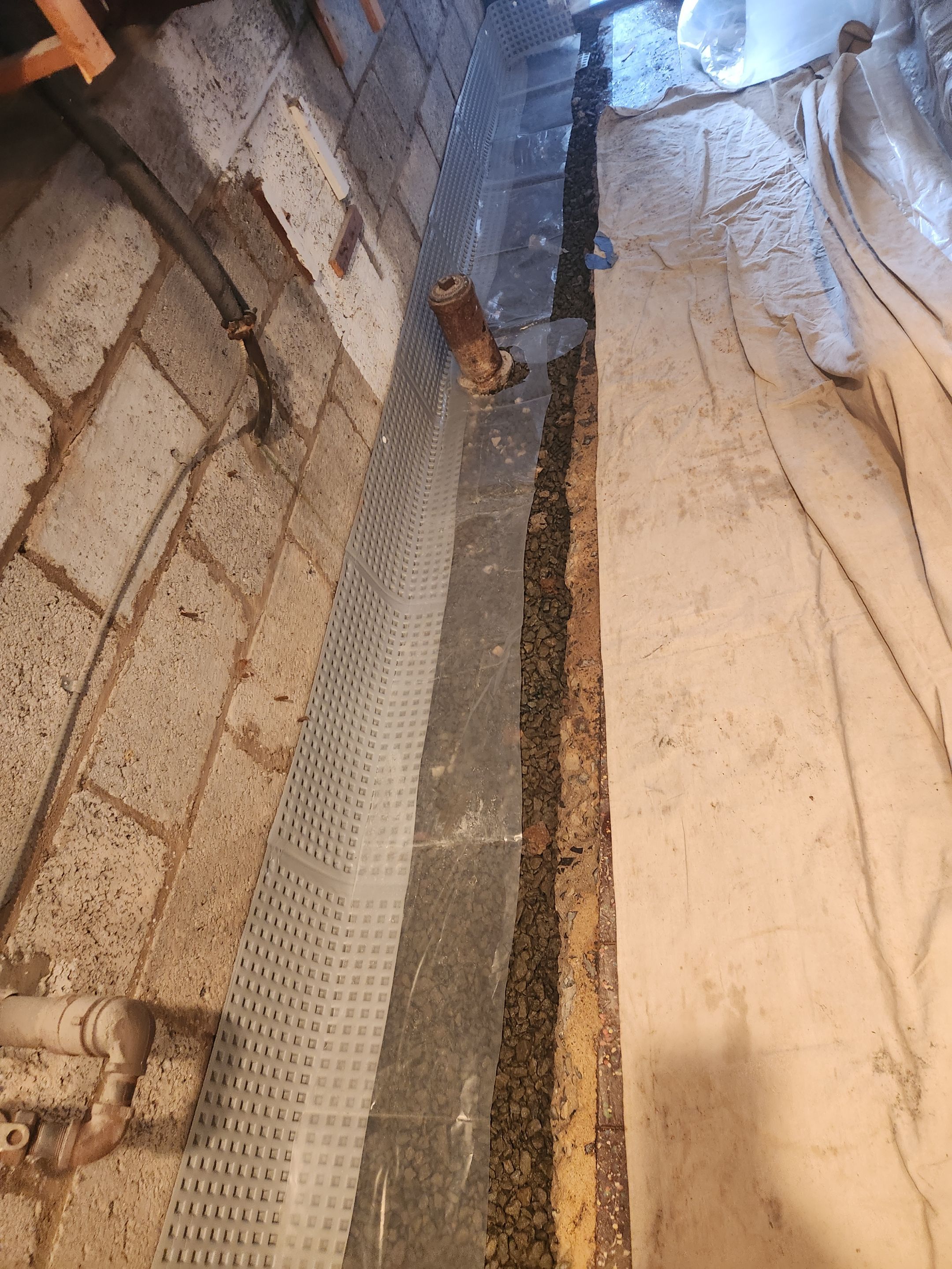 Interior French Drain West Orange NJ by Pure Service Pro, LLC 