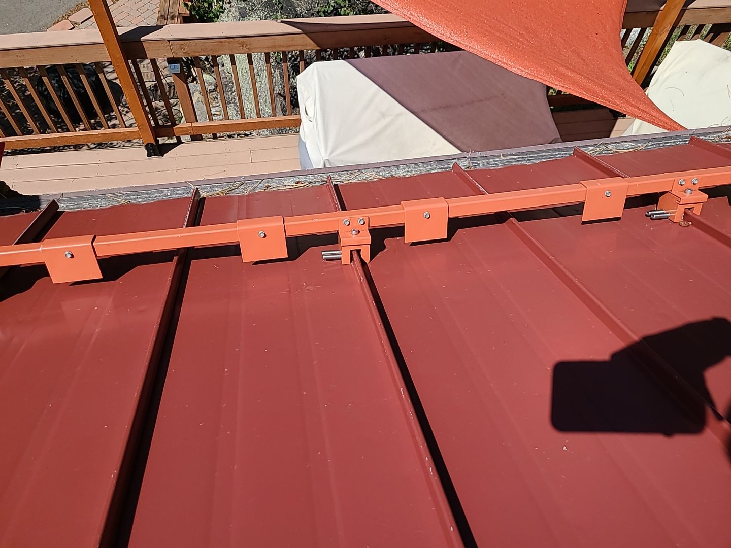 Residential Roofing Installation using Standing Seam Metal by Blue Peaks Roofing LLC 