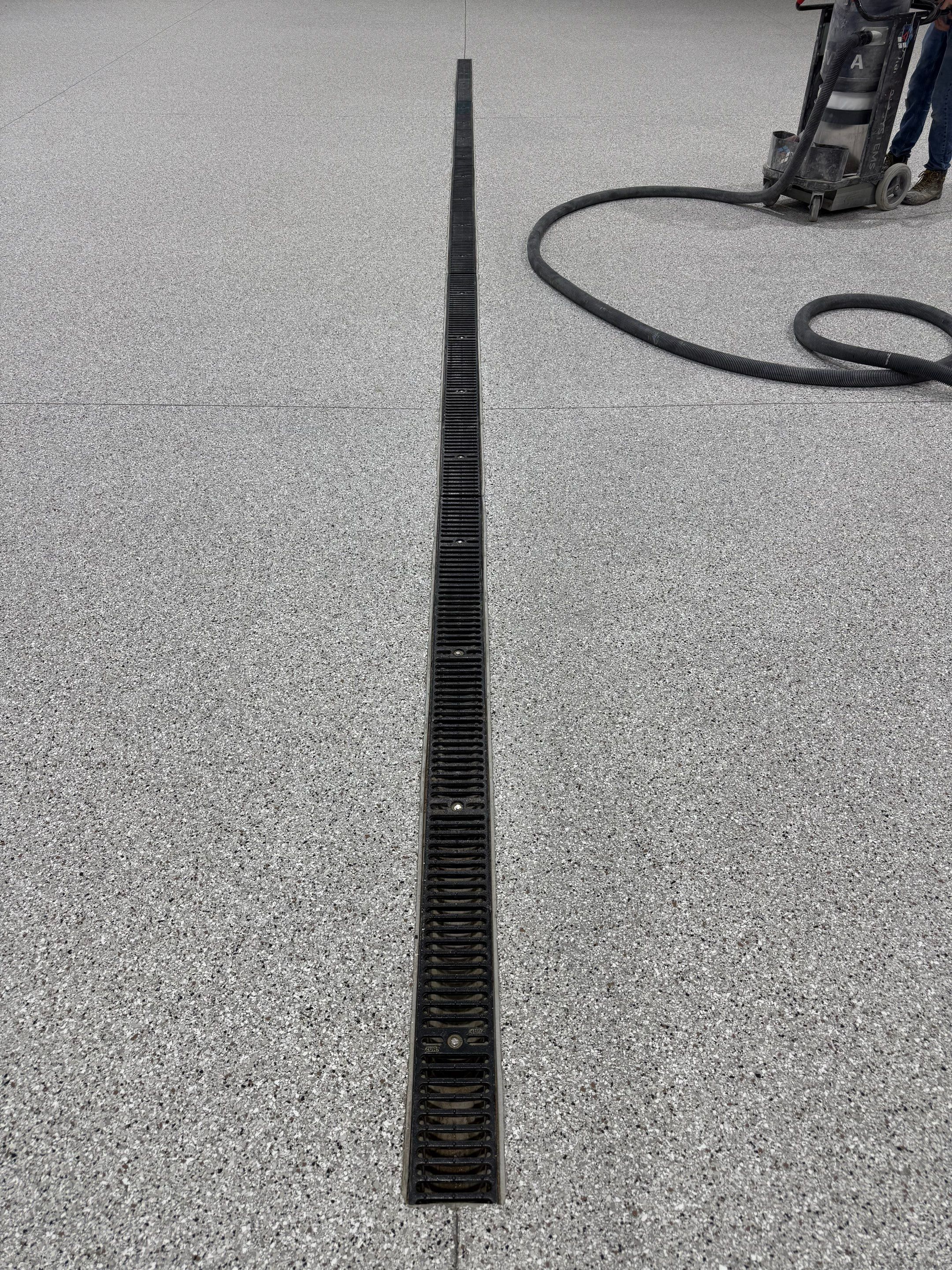 Custom Speckled Floor Coating for Large Montrose Shop by Select Painting, Coatings & Garage Cabinets