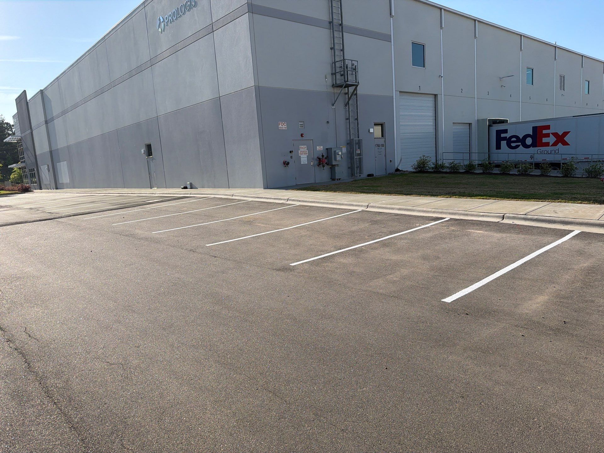 Exterior Commercial Improvements – Parking Lot & Wall Painting by Billy Weatherspoon Contractor