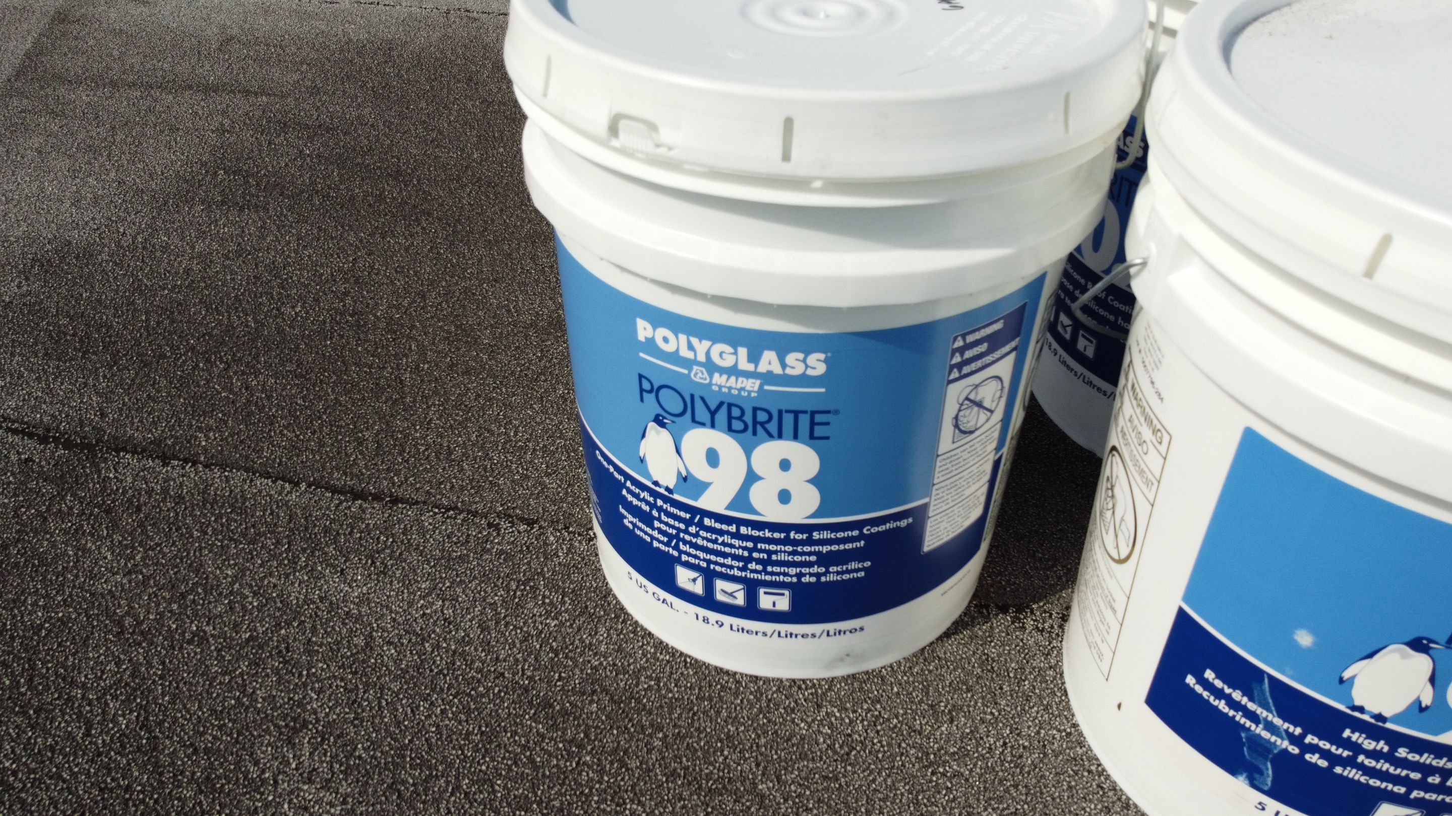 Residential Roofing Installation using Polybrite 90.1 silicone coating by BLUES BROTHERS CONSTRUCTION CORP