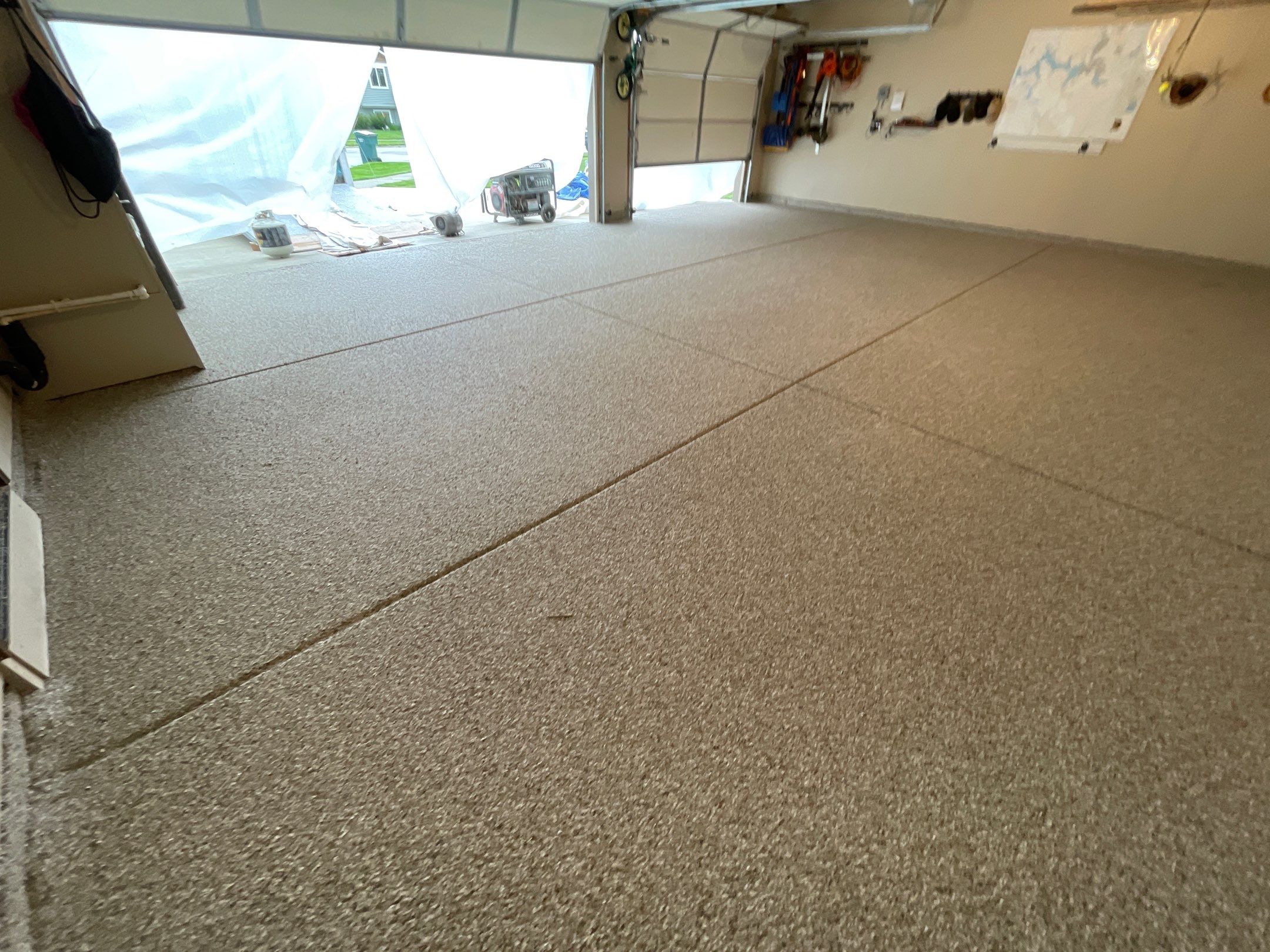 Garage Transformation using Pebble Beach and Front Porch using Greystone by Croc Coatings, LLC