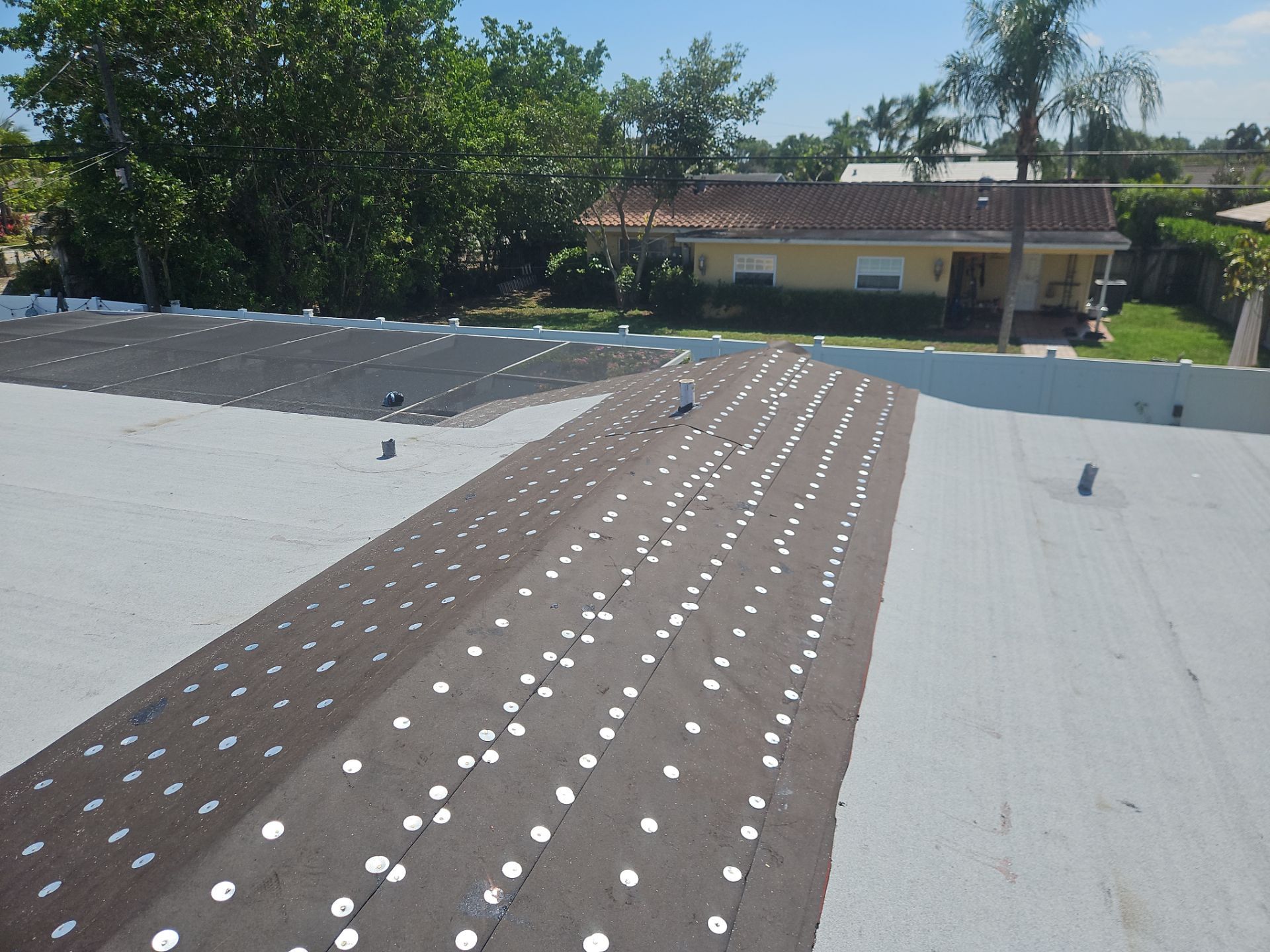 Residential Roofing Installation using 1" Nail strip metal roof by BLUES BROTHERS ROOFING