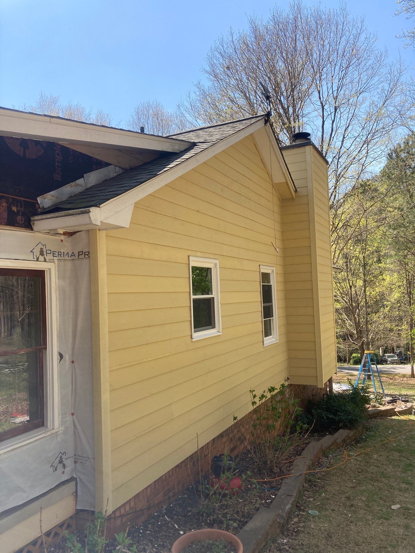 Window, Siding, & Rotten Wood Replacement with Exterior Painting in Woodstock, GA by Nelson Exteriors 