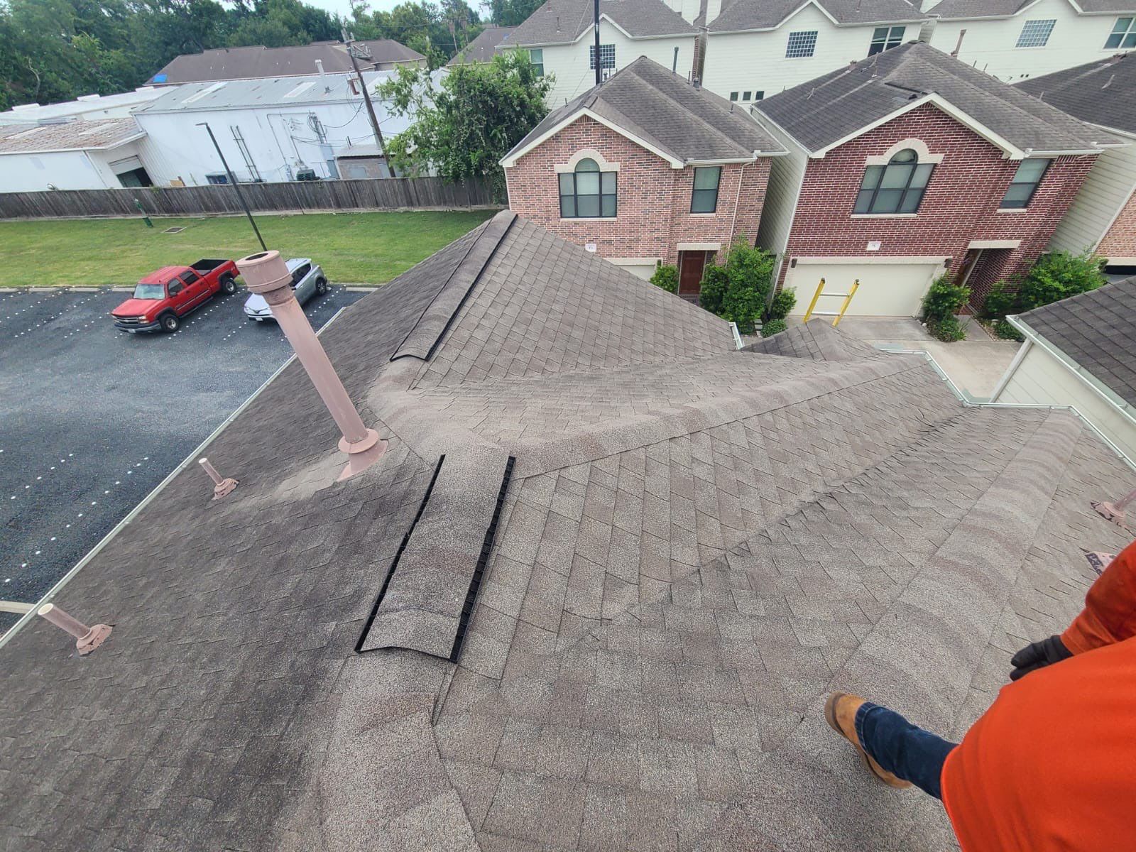 Hail Damage using Owen's Corning Duration (Lifetime) Shingles by Roof Repair Company