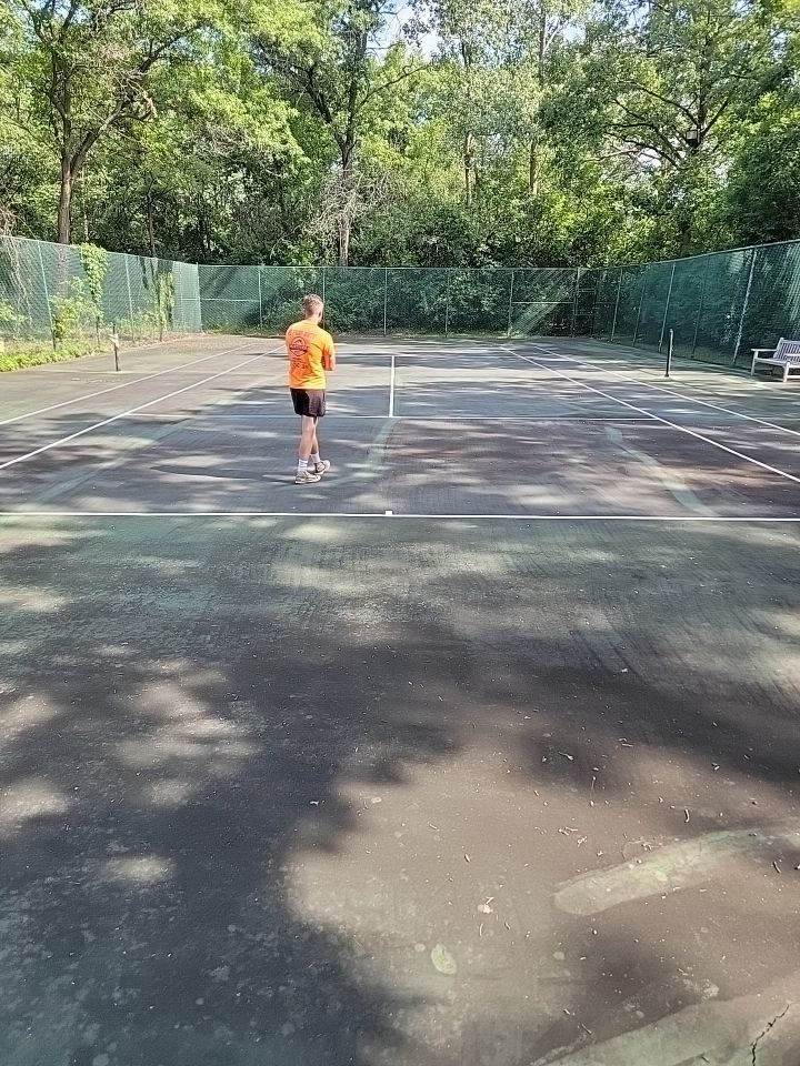 Tennis court cleaning by Northern Power Washing LLC.
