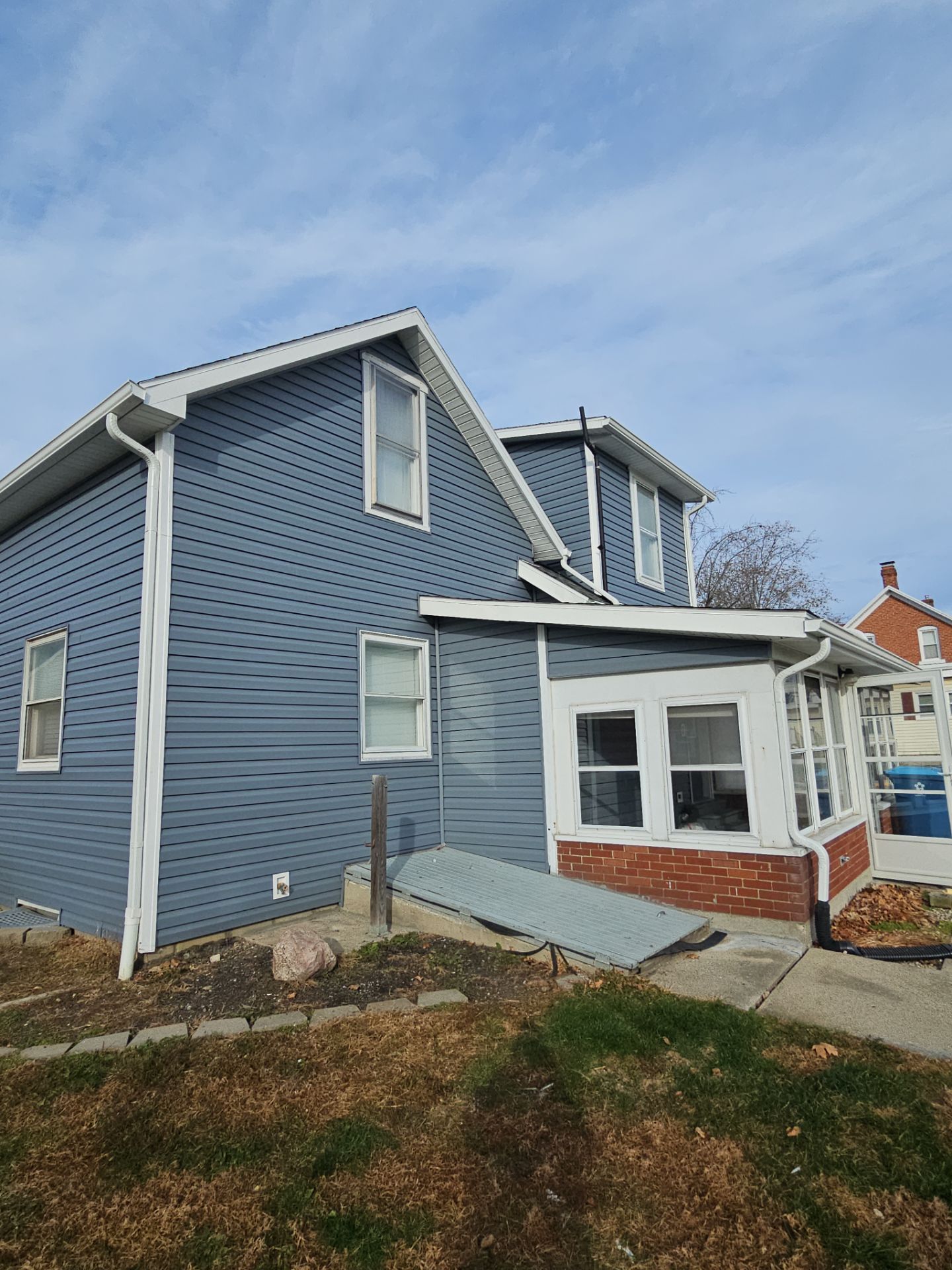 Siding Replacement by Nitro Roofing and Construction