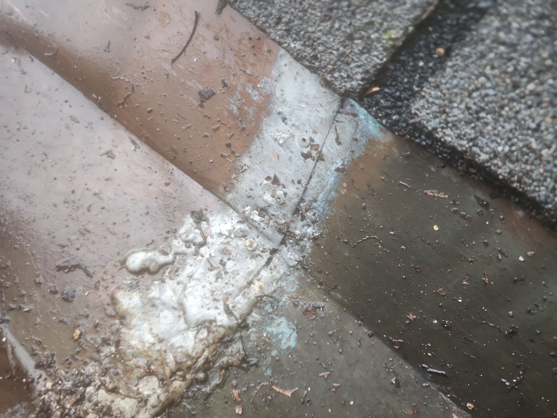 Richmond Reroofing crew working on asphalt shingle installation