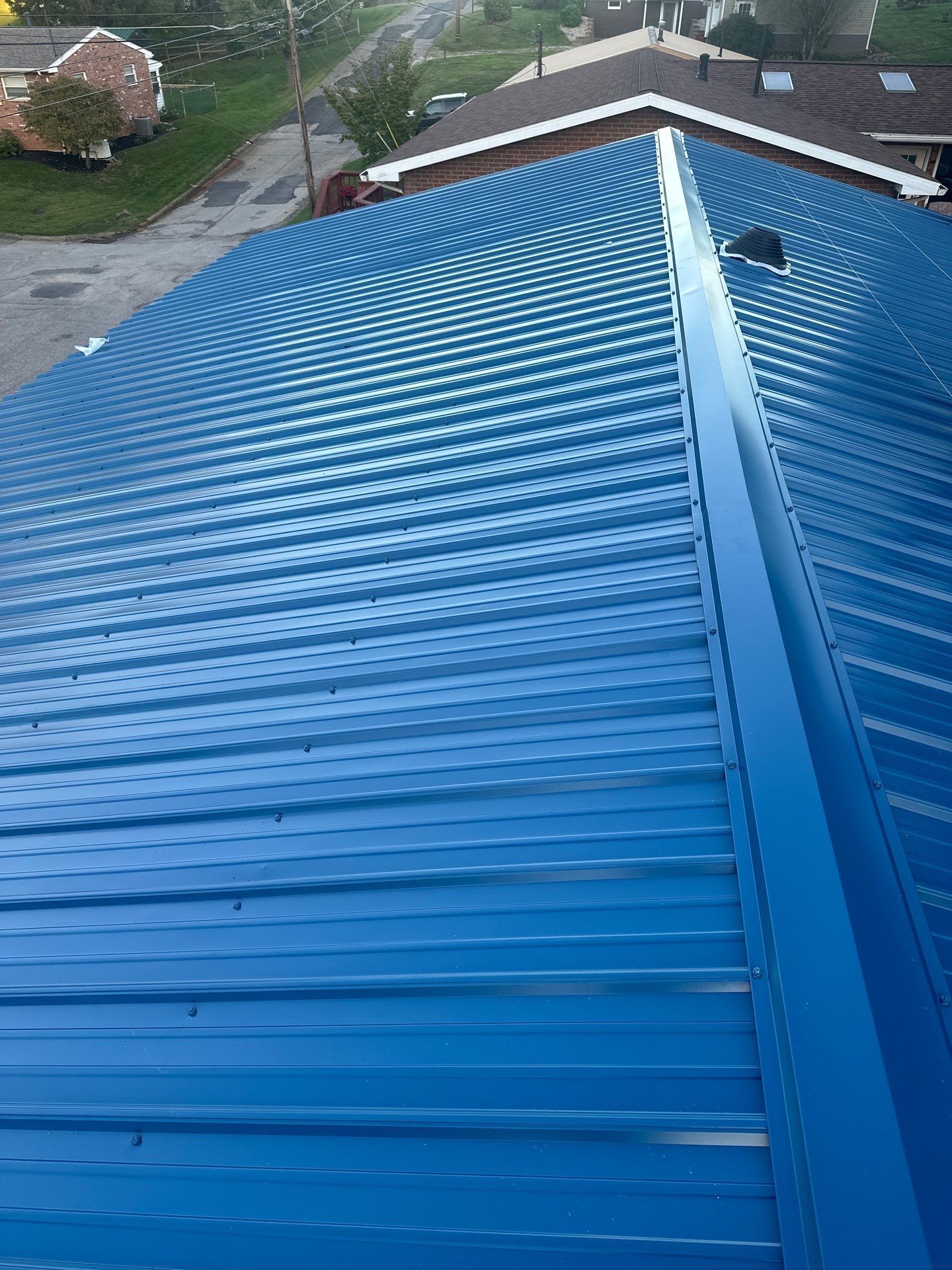 Residential Roofing Installation using Metal by Rainstoppers Roofing