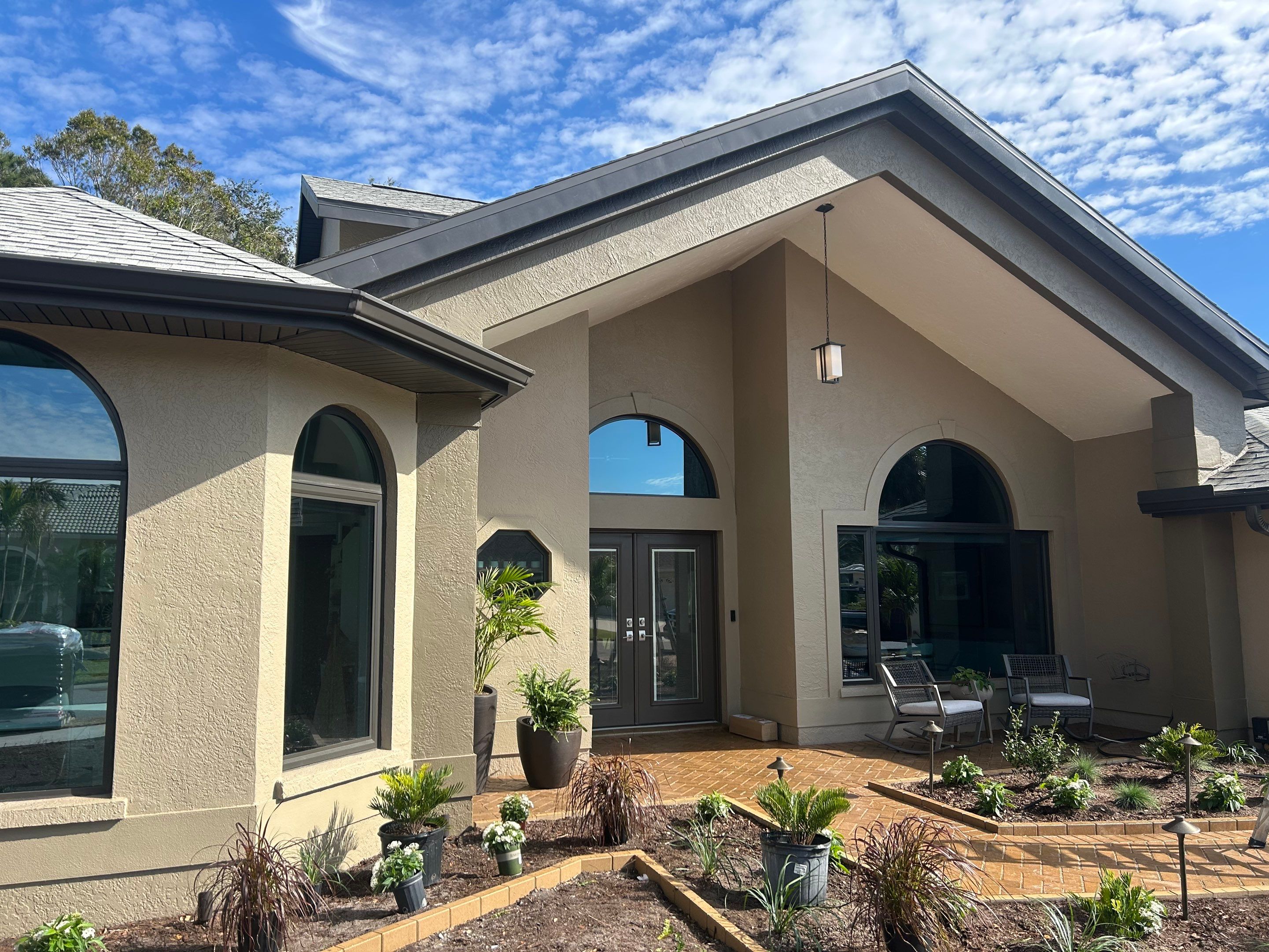 Black Seamless Gutters in Sarasota FL by Gutter Professors