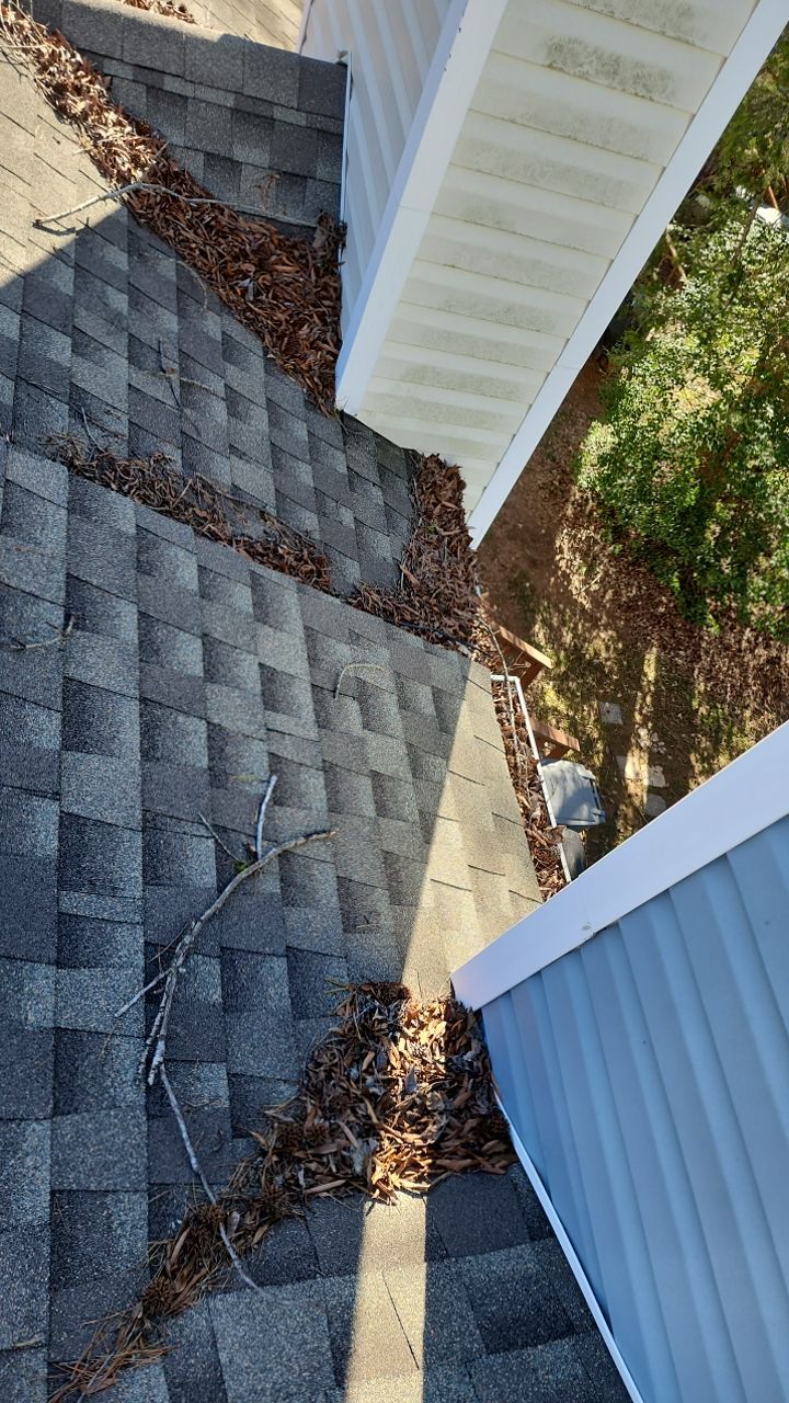 Gutter Cleaning using water by Power Wash Masters LLC