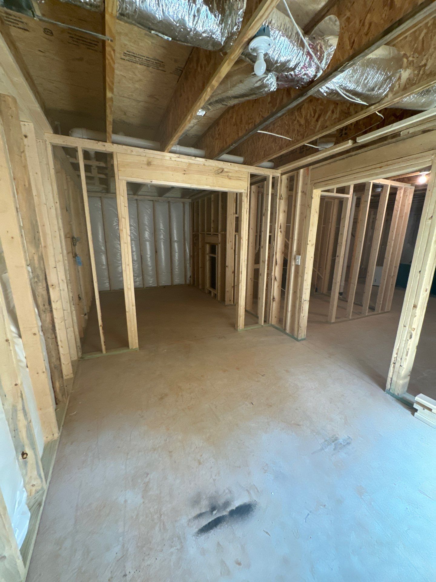 Finished Basement in Acworth Featuring a Full Bathroom and Bar by Swift Home Renovations
