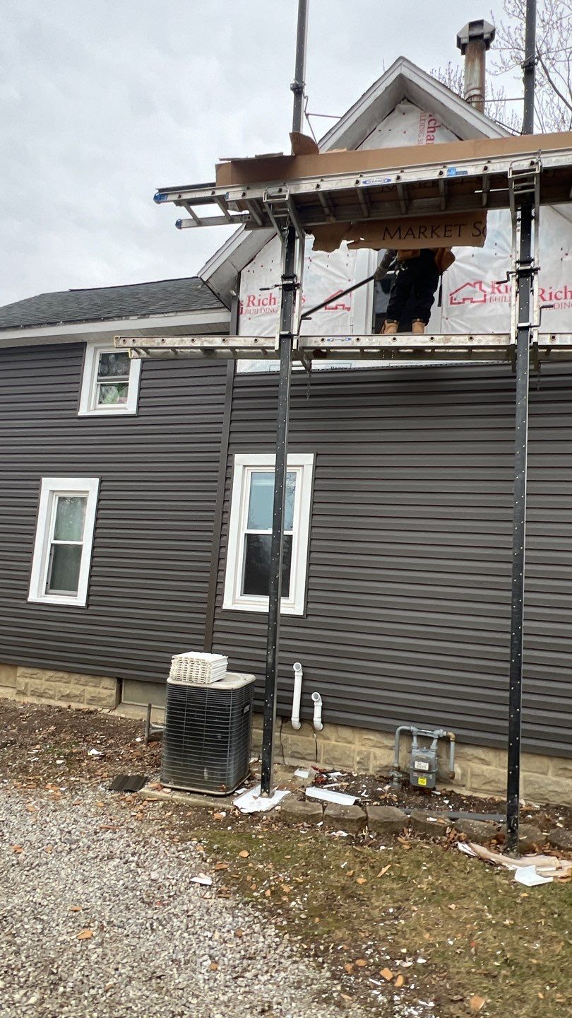 Residential fascia replacement using Exterior Portfolio 4.5 DL - Peppercorn by Nitro Roofing and Construction