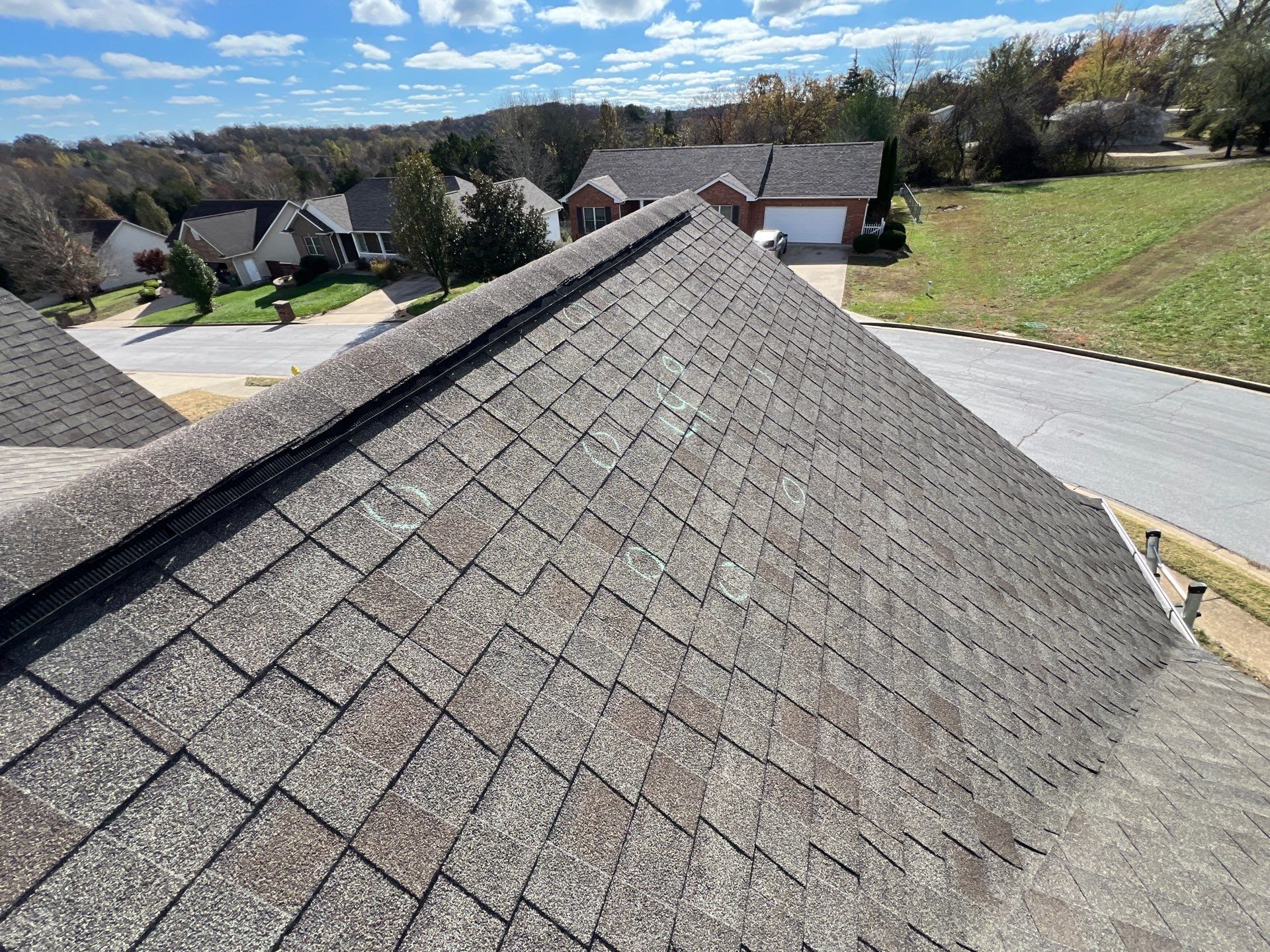 Residential Roof + Gutters & Downspouts Install  by Titan Commercial & Residential Roofing 