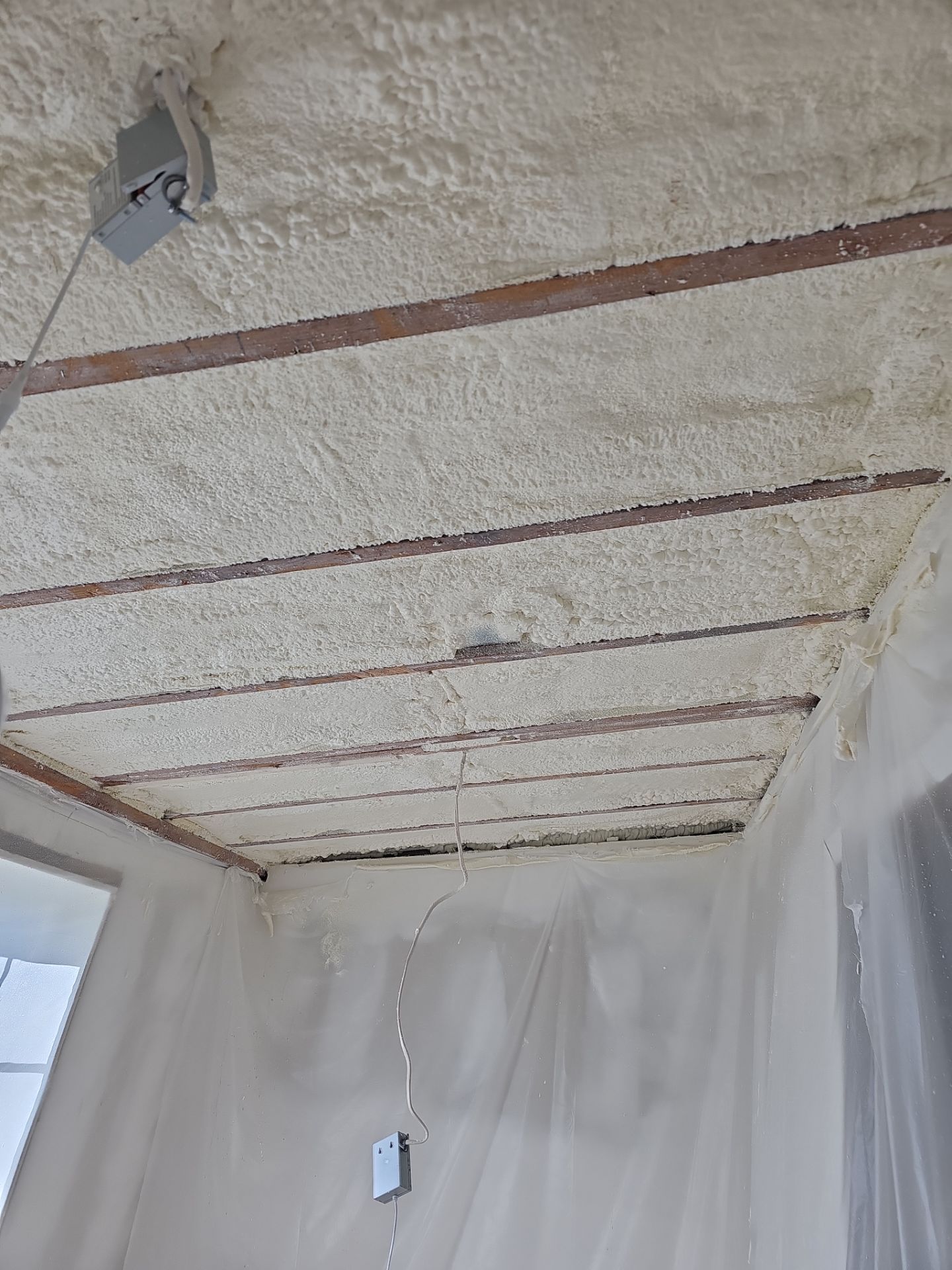 Basement Exterior Walls using Closed Cell Spray Foam by NYS Foam & Energy