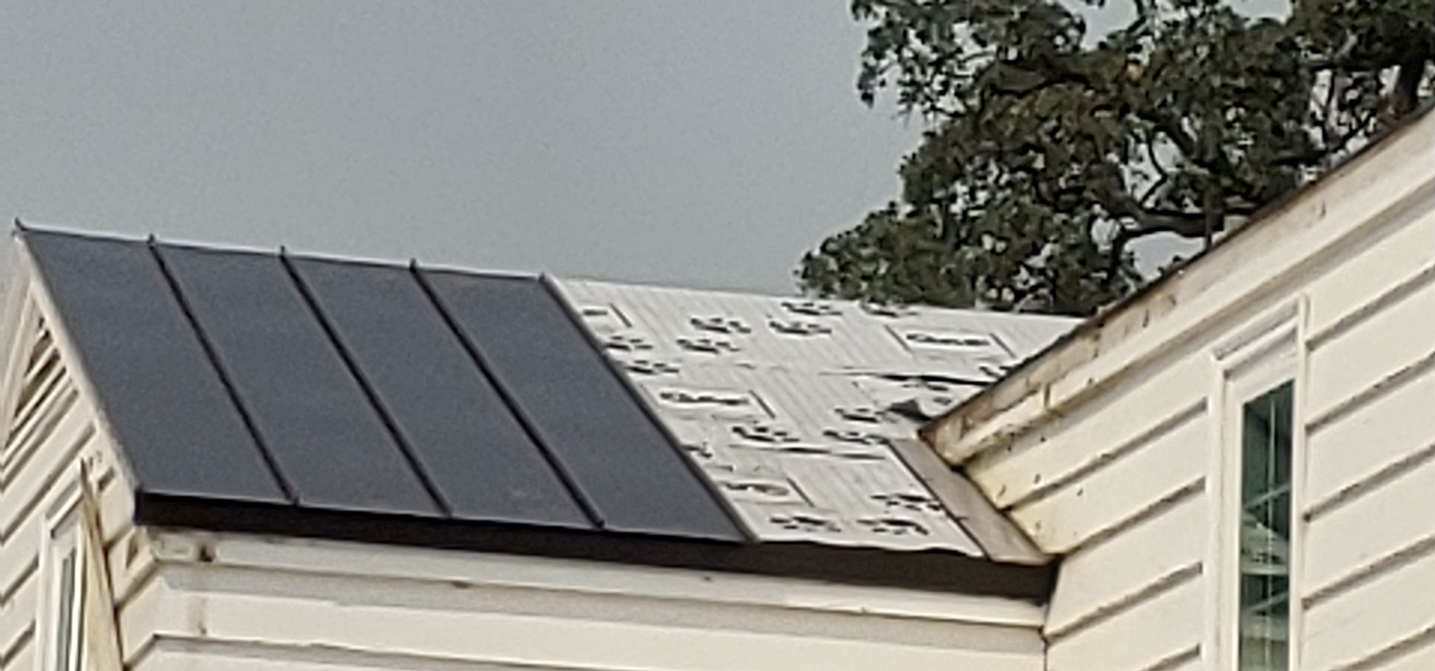 Residential Roofing Installation using Standing seam metal roofing system by Straight Edge Roofing Inc