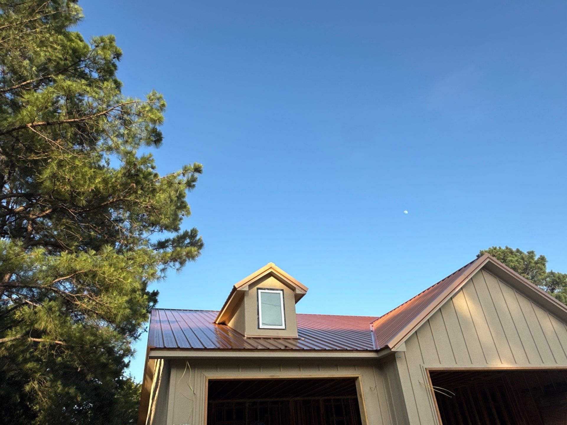 Copper Metallic 26-gauge low rib metal roofing. by In & Out Construction & Remodeling, LLC