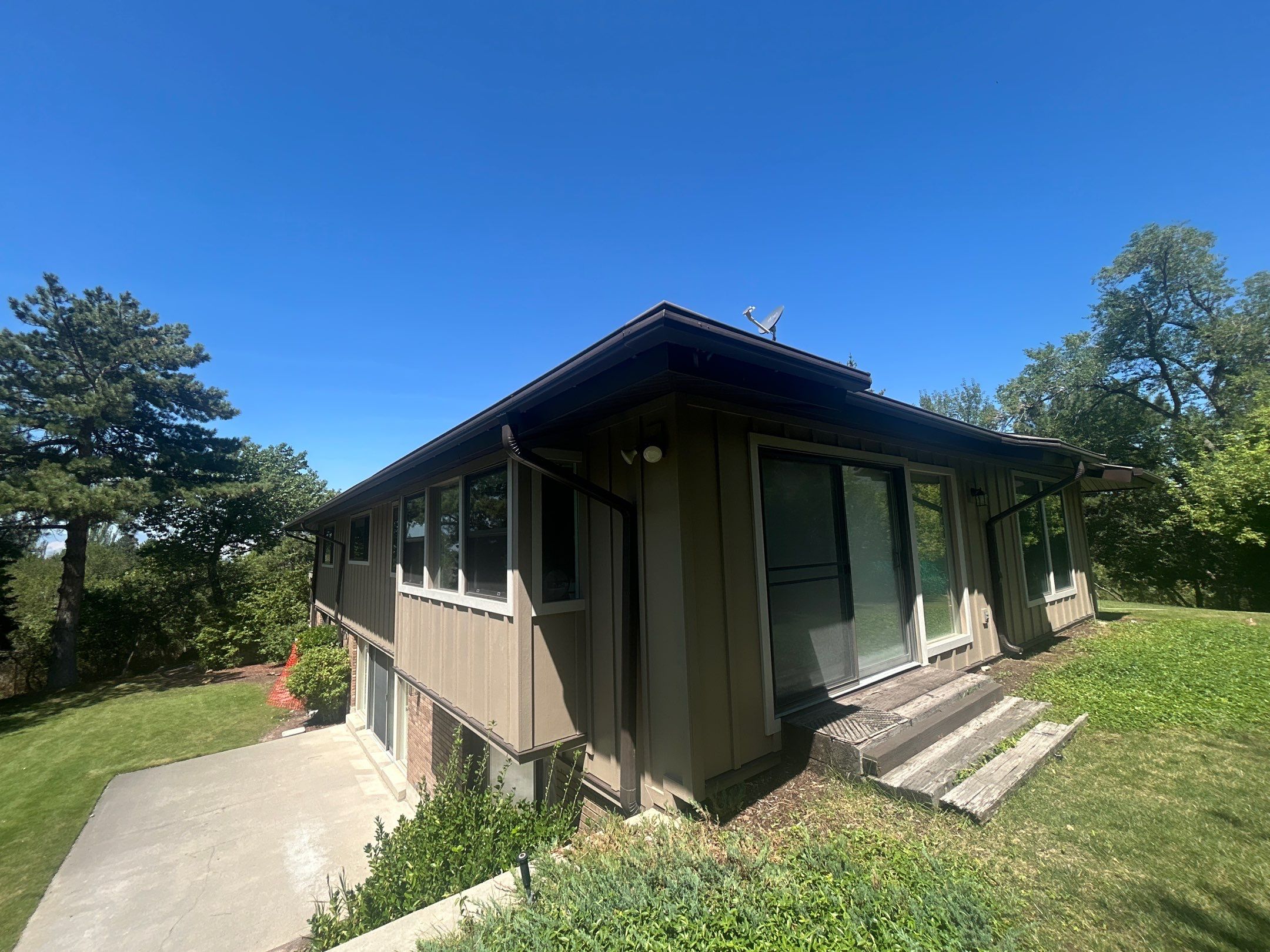Complete Hardie Colorplus Board and Batten replacement with Custom Soffit Transformation in Sandy by Ideal Siding Utah