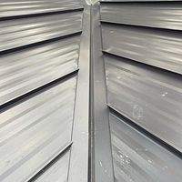 24ga 1.5" Mechanical Seam Dark Bronze by Total Roofing System The Metal Roof Experts