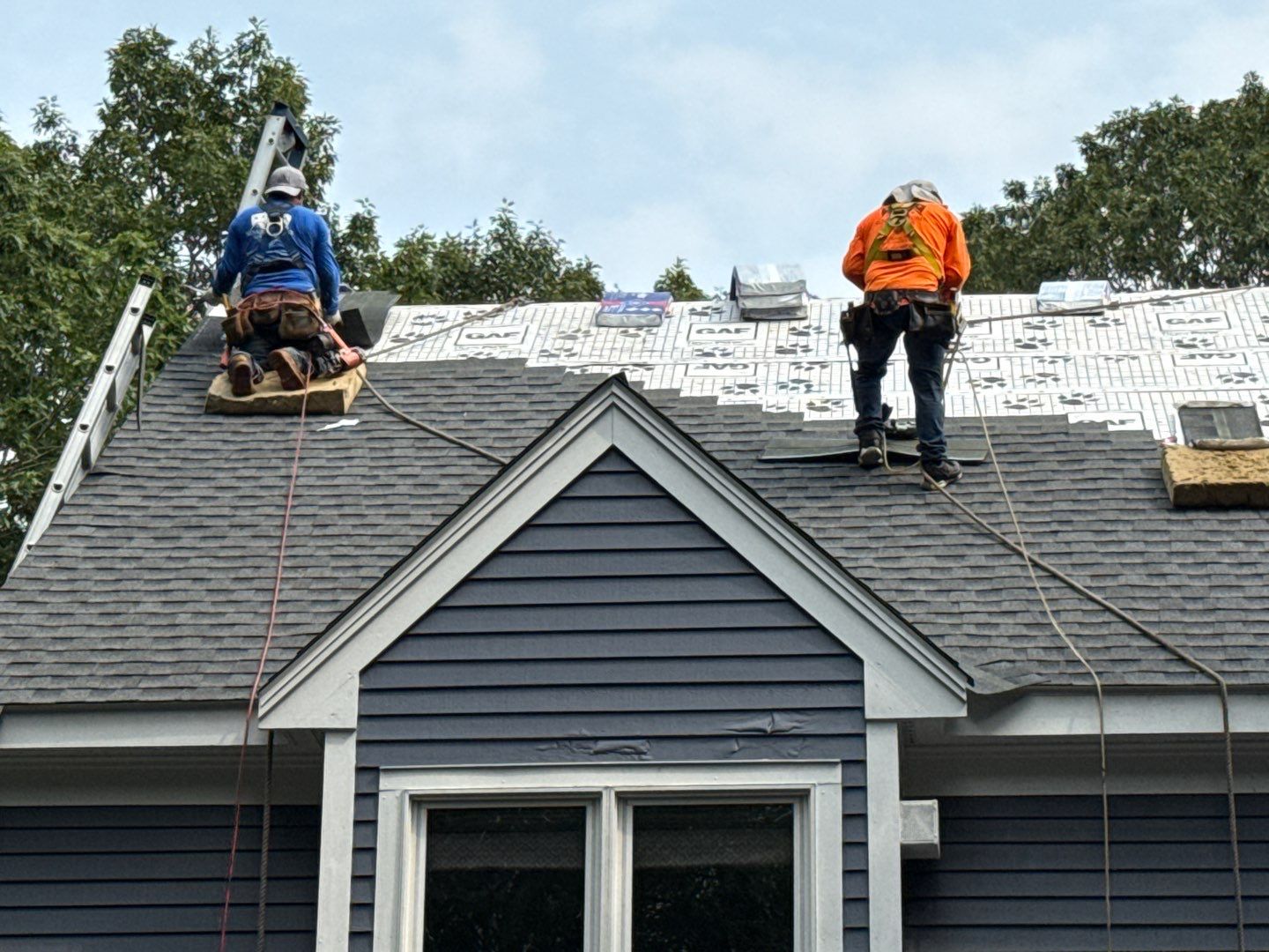 Solar-Ready Roof Replacement with GAF Pewter Gray Shingles & VELUX Skylights by Sensible Home Solutions
