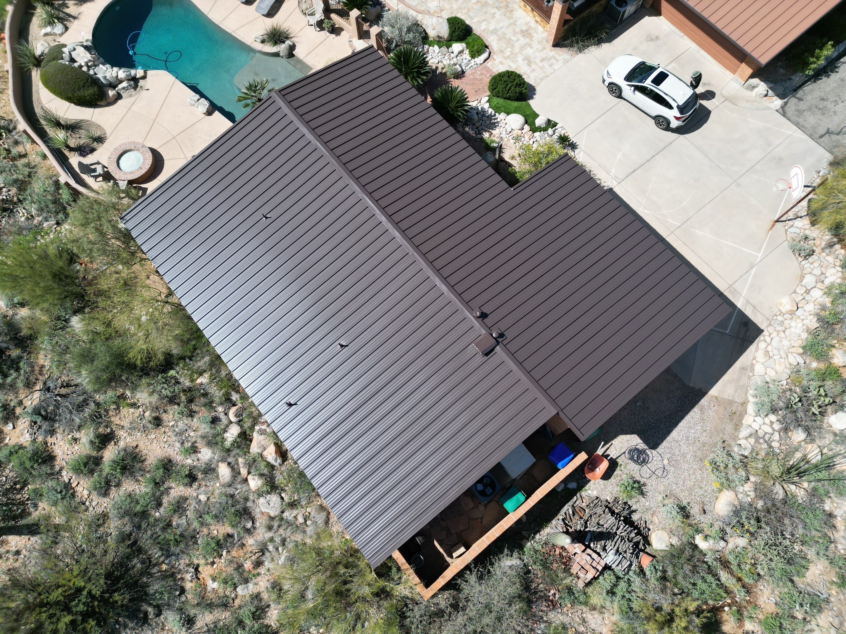 Dark Bronze Standing Seam by Reimagine Roofing