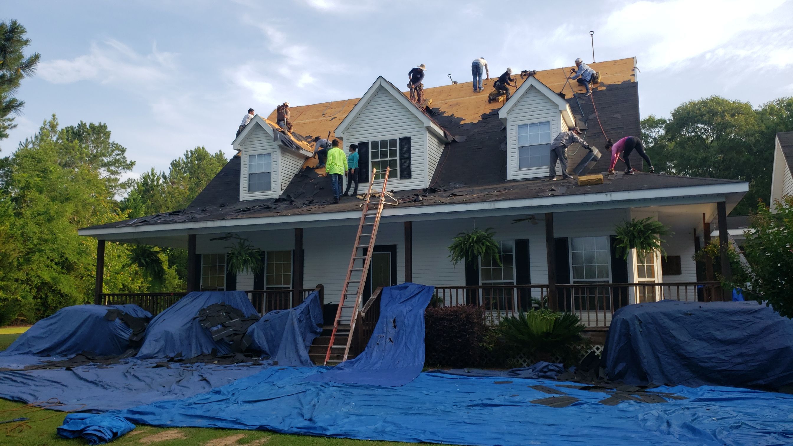 Residential Roofing Installation using Roof Replacement by American Roofing & Construction LLC