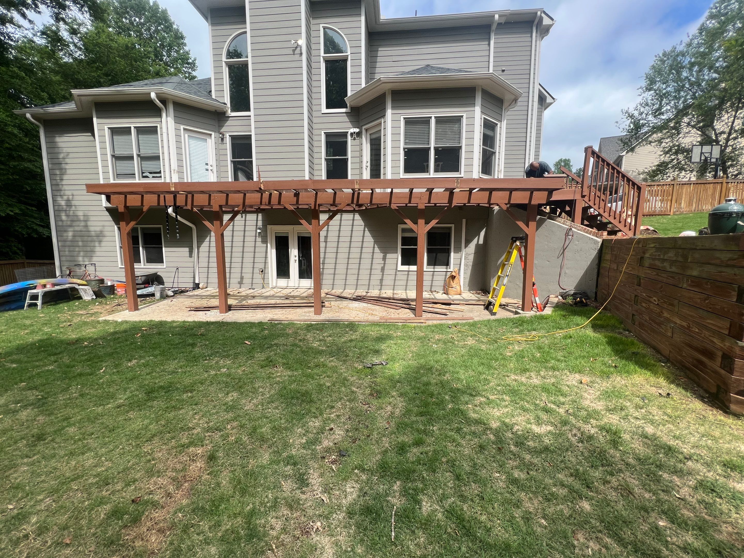 Elevated Wood Deck Replacement and Staircase Installation in Woodstock by Swift Home Renovations