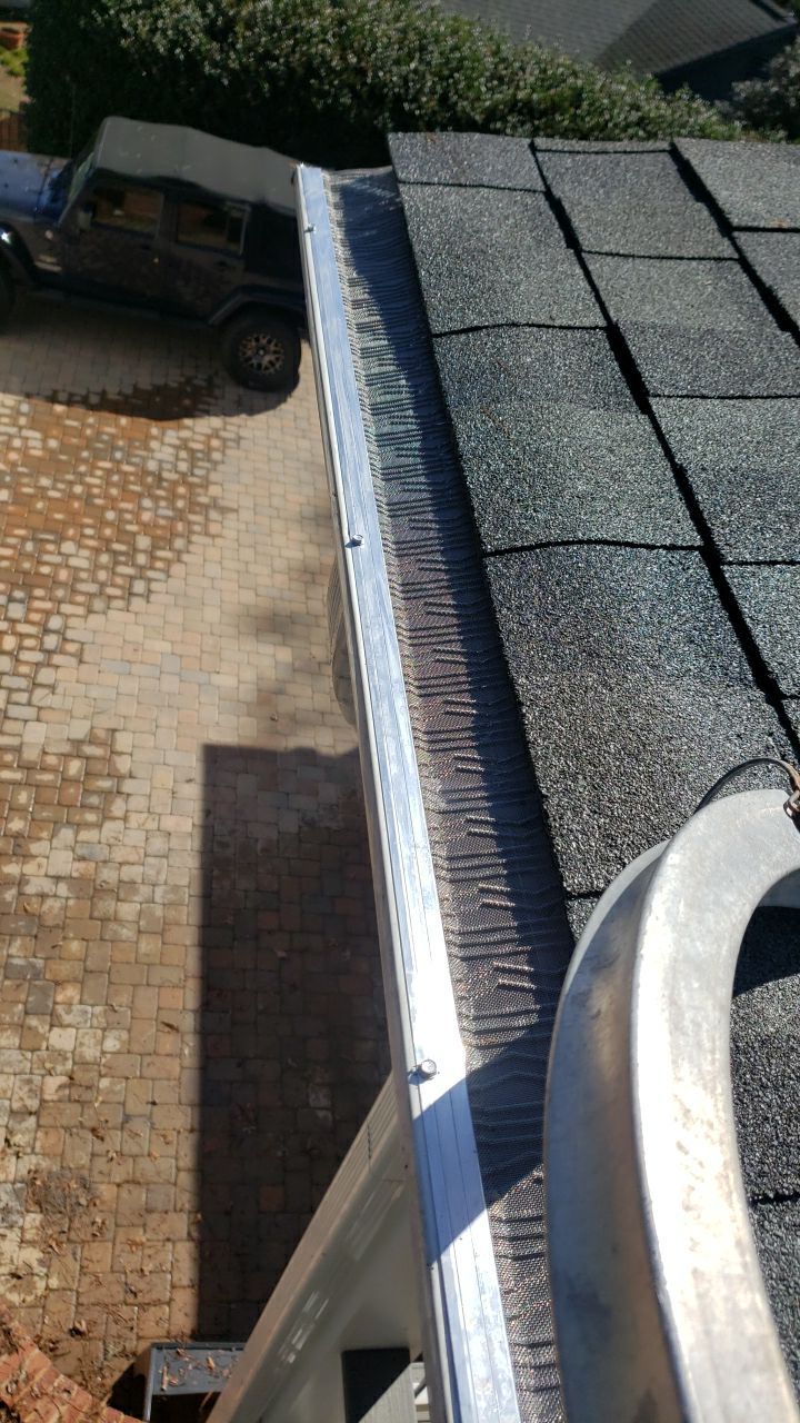 Gutter Cleaning using water by Power Wash Masters LLC