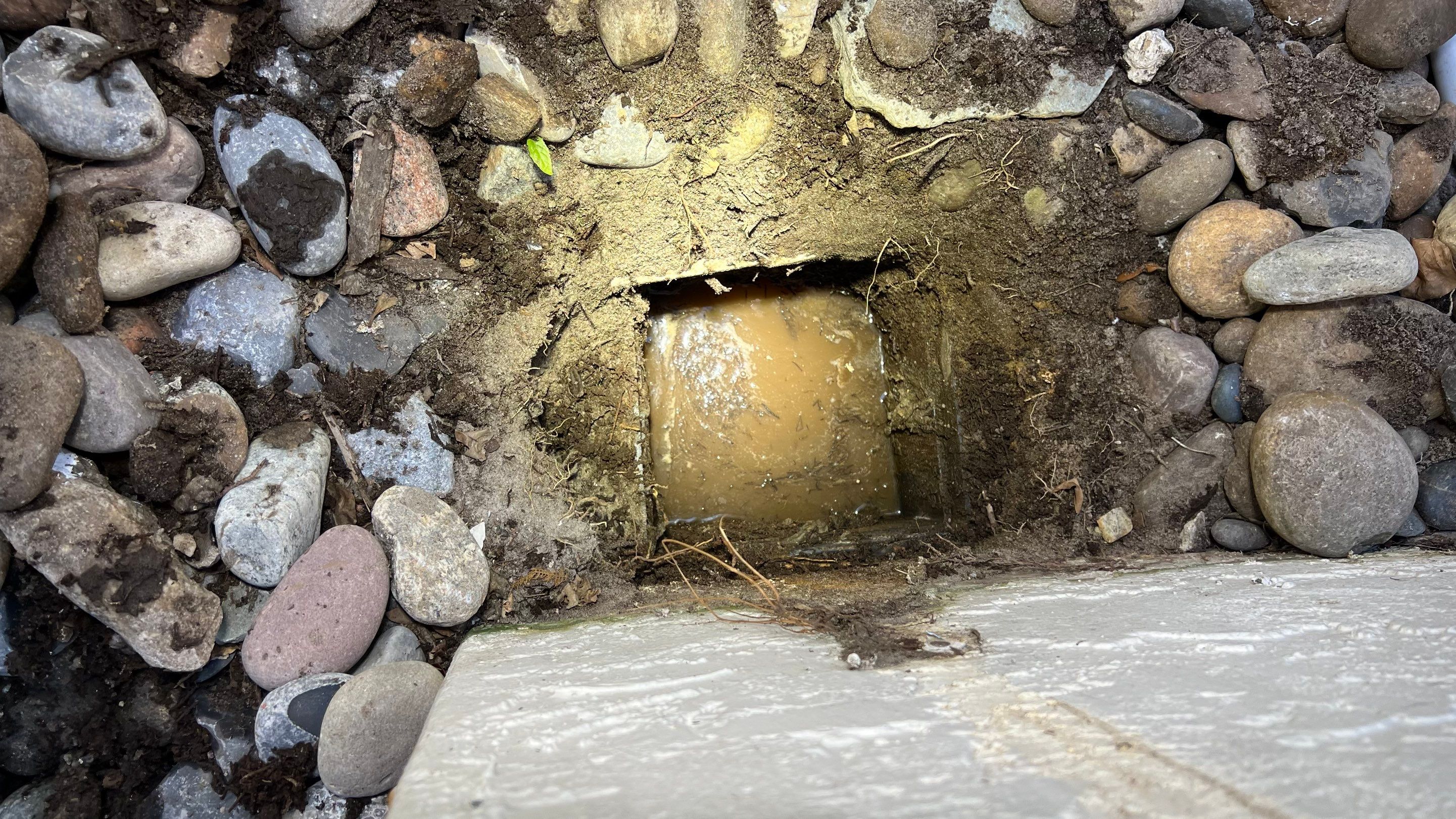 Residential Stormwater Gutter Drain System Maintenance by APS Power & Water
